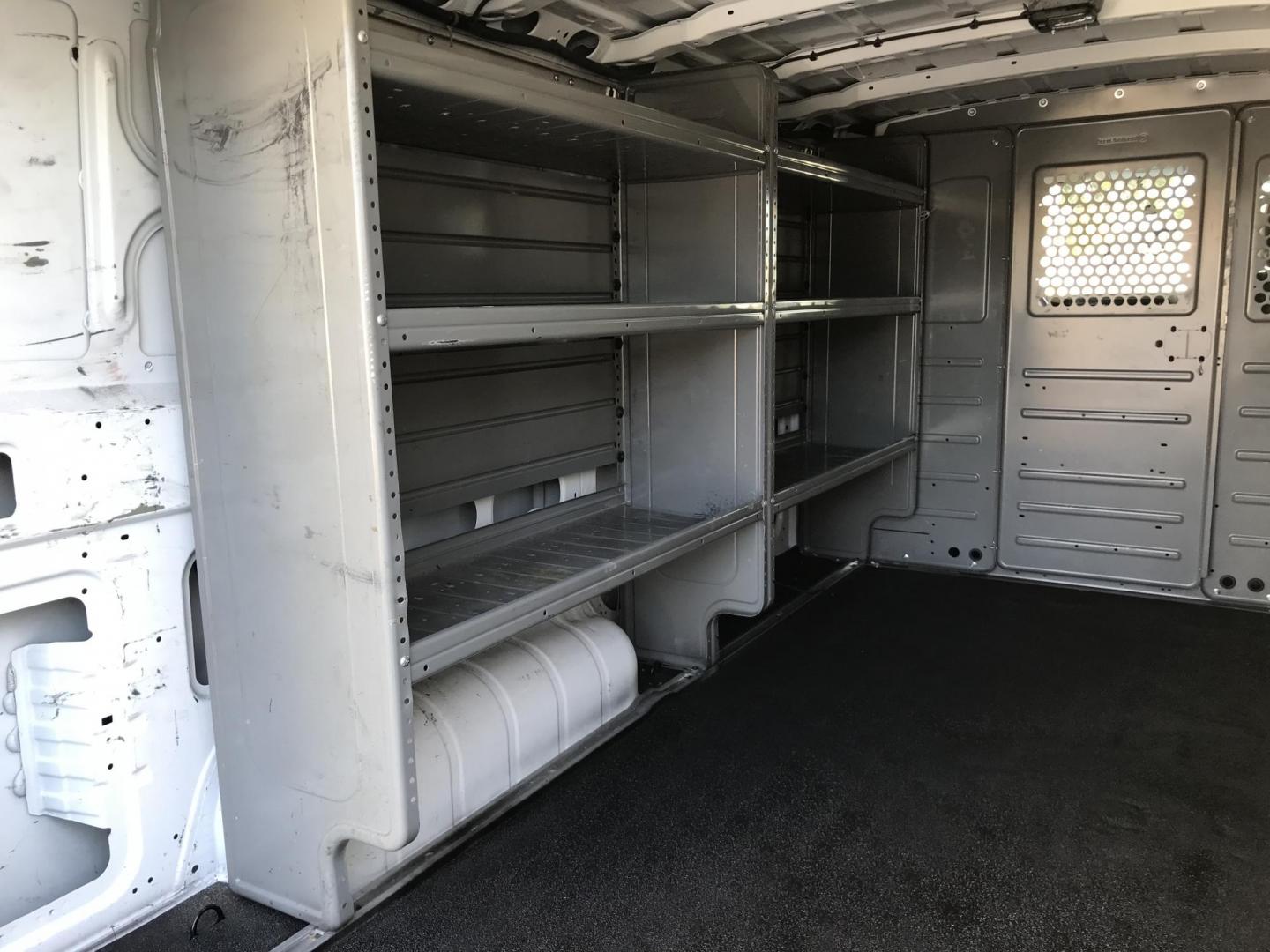 2019 White /Gray Nissan NV Cargo 2500 HD S V6 (1N6BF0KY4KN) with an 4.0L V6 engine, 5A transmission, located at 577 Chester Pike, Prospect Park, PA, 19076, (610) 237-1015, 39.886154, -75.302338 - 2019 Nissan NV 2500: multiple pieces of shelving, partition, no side or rear windows, new PA inspection, SUPER CLEAN and FLEET MAINTAINED! This vehicle comes inspected and has been given a bumper to bumper safety check. It is very clean, reliable, and well maintained. We offer a unique pay plan t - Photo#18