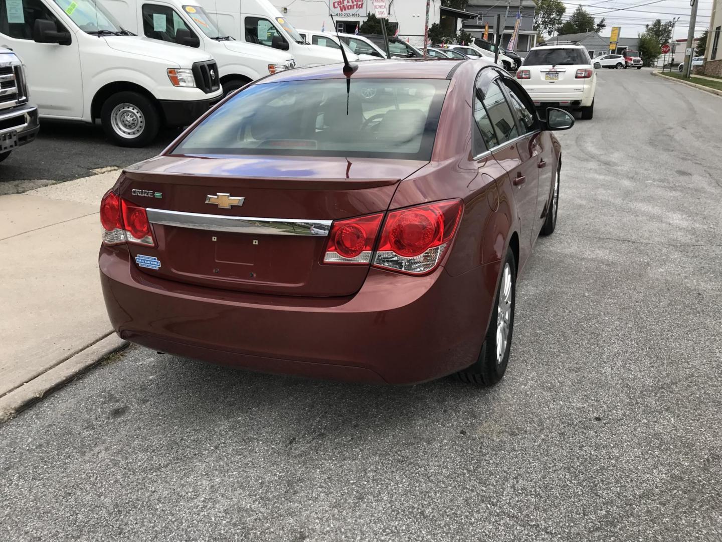2012 Orange /Gray Chevrolet Cruze Eco (1G1PJ5SC7C7) with an 1.4L L4 DOHC 16V TURBO engine, 6-Speed Automatic transmission, located at 577 Chester Pike, Prospect Park, PA, 19076, (610) 237-1015, 39.886154, -75.302338 - 2012 Chevy Cruze: Only 135k miles, great on gas, new PA inspection, SUPER CLEAN, runs LIKE NEW! This vehicle comes inspected and has been given a bumper to bumper safety check. It is very clean, reliable, and well maintained. We offer a unique pay plan that is known for being the easiest and fast - Photo#6