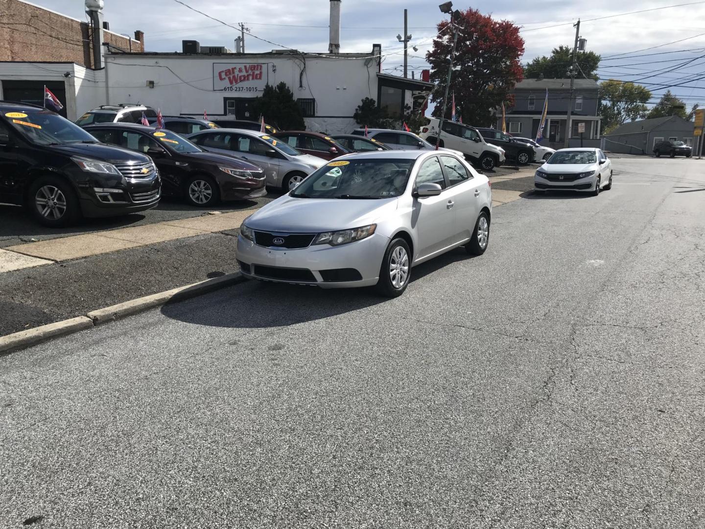 2012 Silver /Gray Kia Forte EX (KNAFU4A27C5) with an 2.0L L4 DOHC 16V engine, Automatic transmission, located at 577 Chester Pike, Prospect Park, PA, 19076, (610) 237-1015, 39.886154, -75.302338 - Photo#1