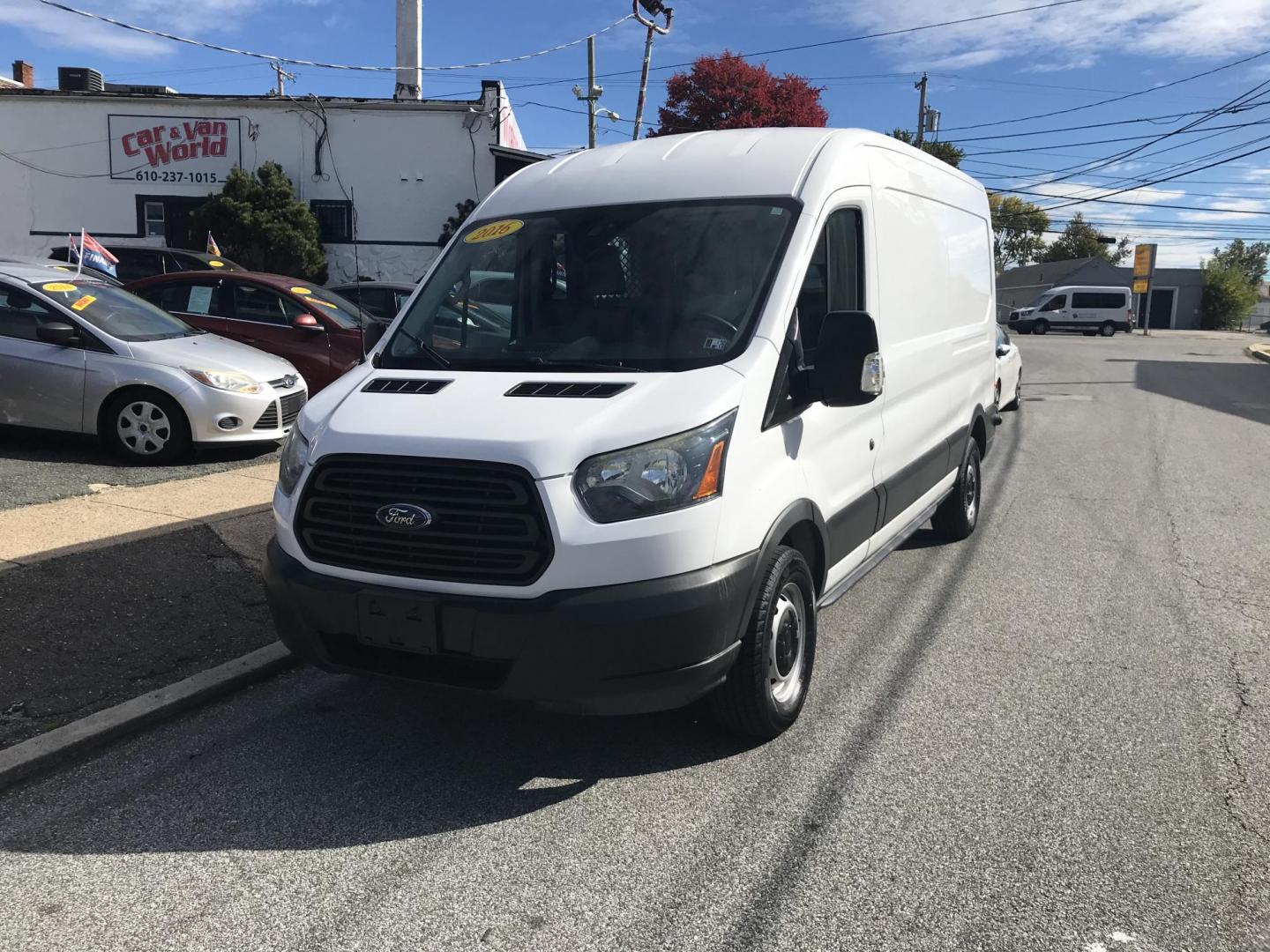 2016 White /Gray Ford Transit 250 Van Med. Roof w/Sliding Pass. 148-in. WB (1FTYR2CM1GK) with an 3.7L V6 DOHC 24V engine, 6-Speed Automatic transmission, located at 577 Chester Pike, Prospect Park, PA, 19076, (610) 237-1015, 39.886154, -75.302338 - 2016 Ford Transit 250 Medium Roof: Has multiple pieces of shelving, partition, new PA inspection, FLEET MAINTAINED, runs LIKE NEW! This vehicle comes inspected and has been given a bumper to bumper safety check. It is very clean, reliable, and well maintained. We offer a unique pay plan that is k - Photo#2