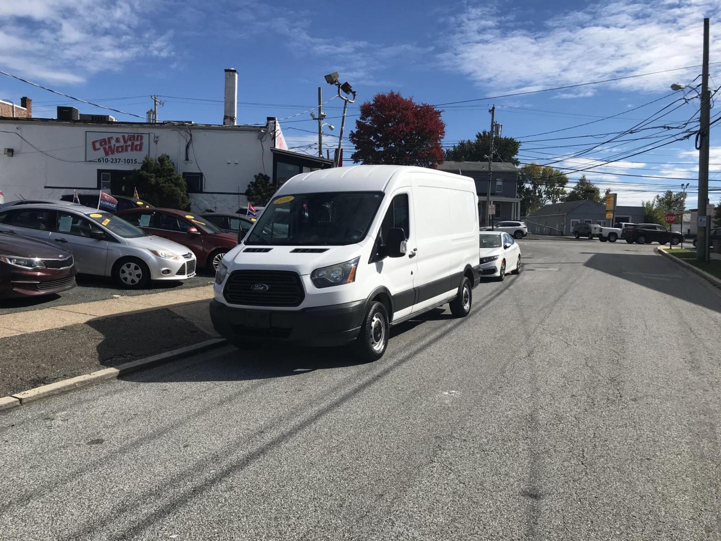 2016 White /Gray Ford Transit 250 Van Med. Roof w/Sliding Pass. 148-in. WB (1FTYR2CM1GK) with an 3.7L V6 DOHC 24V engine, 6-Speed Automatic transmission, located at 577 Chester Pike, Prospect Park, PA, 19076, (610) 237-1015, 39.886154, -75.302338 - 2016 Ford Transit 250 Medium Roof: Has multiple pieces of shelving, partition, new PA inspection, FLEET MAINTAINED, runs LIKE NEW! This vehicle comes inspected and has been given a bumper to bumper safety check. It is very clean, reliable, and well maintained. We offer a unique pay plan that is k - Photo#1