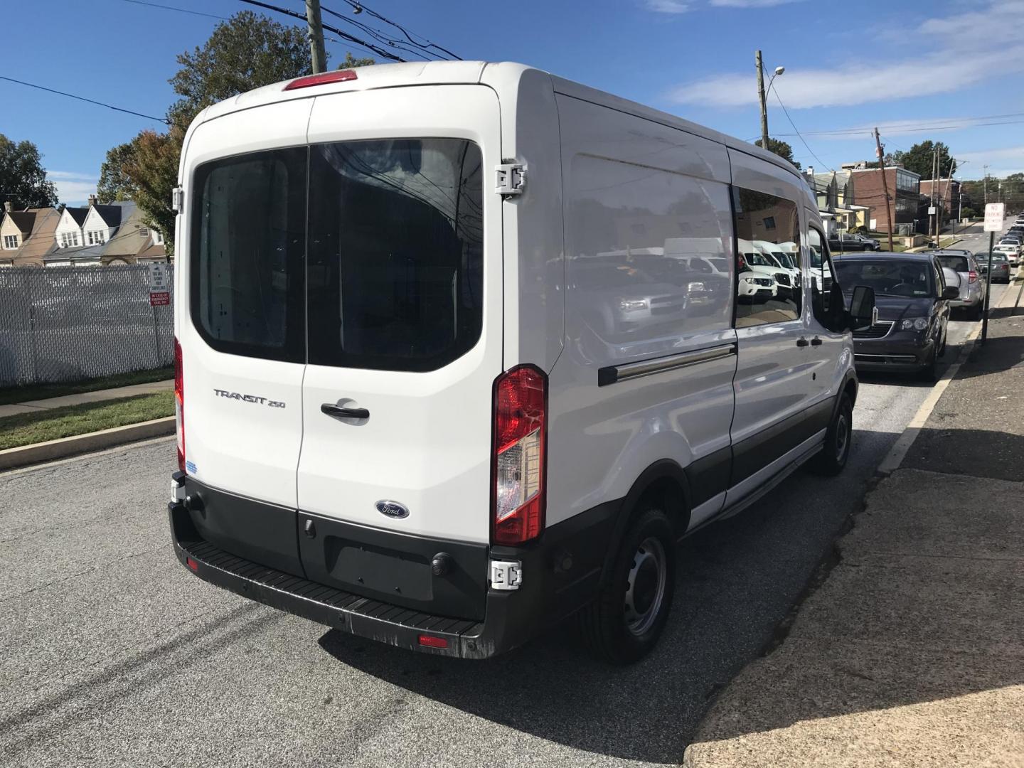 2016 White /Gray Ford Transit 250 Van Med. Roof w/Sliding Pass. 148-in. WB (1FTYR2CM1GK) with an 3.7L V6 DOHC 24V engine, 6-Speed Automatic transmission, located at 577 Chester Pike, Prospect Park, PA, 19076, (610) 237-1015, 39.886154, -75.302338 - 2016 Ford Transit 250 Medium Roof: Has multiple pieces of shelving, partition, new PA inspection, FLEET MAINTAINED, runs LIKE NEW! This vehicle comes inspected and has been given a bumper to bumper safety check. It is very clean, reliable, and well maintained. We offer a unique pay plan that is k - Photo#4