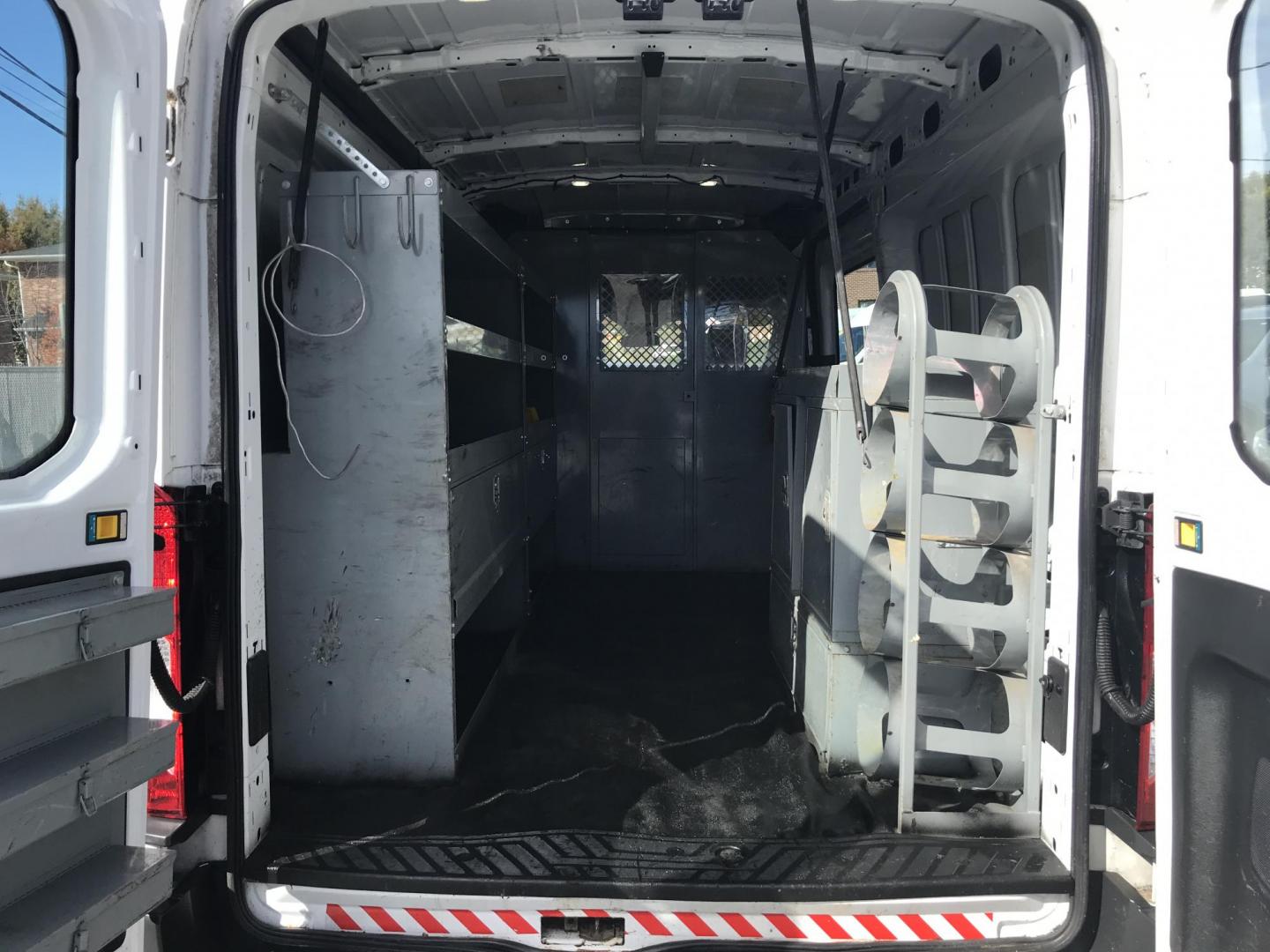 2016 White /Gray Ford Transit 250 Van Med. Roof w/Sliding Pass. 148-in. WB (1FTYR2CM1GK) with an 3.7L V6 DOHC 24V engine, 6-Speed Automatic transmission, located at 577 Chester Pike, Prospect Park, PA, 19076, (610) 237-1015, 39.886154, -75.302338 - 2016 Ford Transit 250 Medium Roof: Has multiple pieces of shelving, partition, new PA inspection, FLEET MAINTAINED, runs LIKE NEW! This vehicle comes inspected and has been given a bumper to bumper safety check. It is very clean, reliable, and well maintained. We offer a unique pay plan that is k - Photo#15