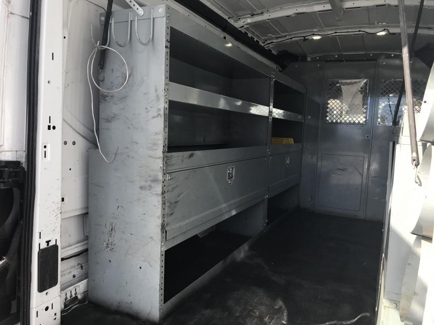 2016 White /Gray Ford Transit 250 Van Med. Roof w/Sliding Pass. 148-in. WB (1FTYR2CM1GK) with an 3.7L V6 DOHC 24V engine, 6-Speed Automatic transmission, located at 577 Chester Pike, Prospect Park, PA, 19076, (610) 237-1015, 39.886154, -75.302338 - 2016 Ford Transit 250 Medium Roof: Has multiple pieces of shelving, partition, new PA inspection, FLEET MAINTAINED, runs LIKE NEW! This vehicle comes inspected and has been given a bumper to bumper safety check. It is very clean, reliable, and well maintained. We offer a unique pay plan that is k - Photo#16