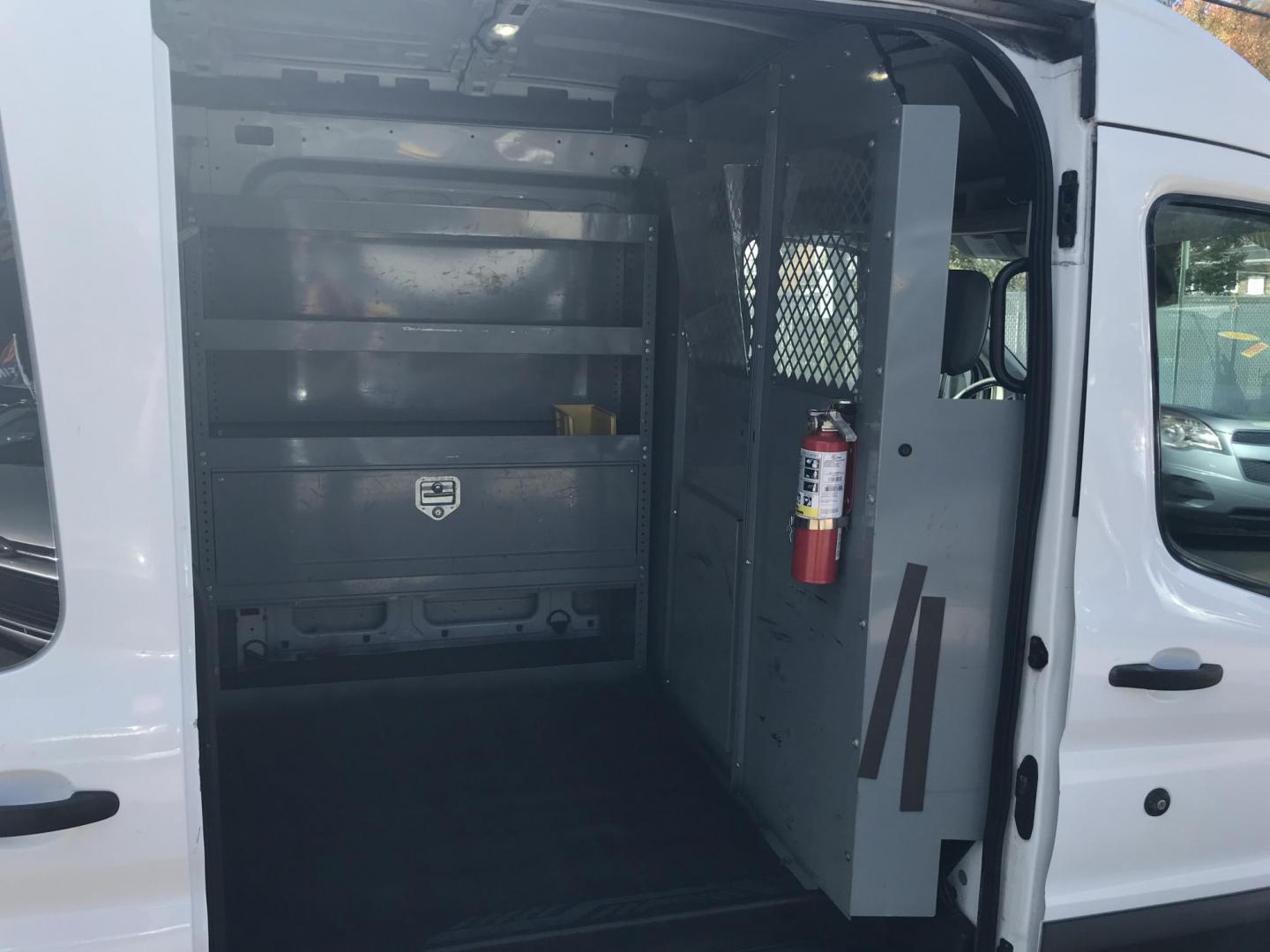 2016 White /Gray Ford Transit 250 Van Med. Roof w/Sliding Pass. 148-in. WB (1FTYR2CM1GK) with an 3.7L V6 DOHC 24V engine, 6-Speed Automatic transmission, located at 577 Chester Pike, Prospect Park, PA, 19076, (610) 237-1015, 39.886154, -75.302338 - 2016 Ford Transit 250 Medium Roof: Has multiple pieces of shelving, partition, new PA inspection, FLEET MAINTAINED, runs LIKE NEW! This vehicle comes inspected and has been given a bumper to bumper safety check. It is very clean, reliable, and well maintained. We offer a unique pay plan that is k - Photo#18