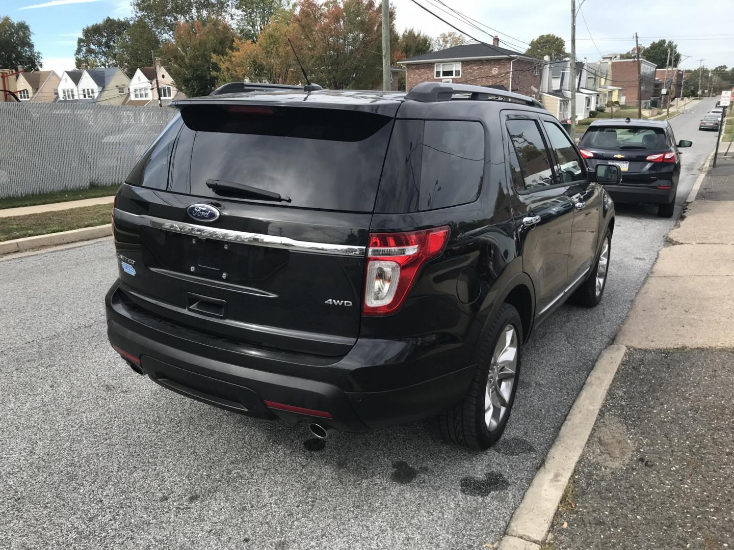 2013 Black /Black Ford Explorer Limited 4WD (1FM5K8F83DG) with an 3.5L V6 DOHC 24V engine, 6-Speed Automatic transmission, located at 577 Chester Pike, Prospect Park, PA, 19076, (610) 237-1015, 39.886154, -75.302338 - 2013 Ford Explorer LIMITED: 3rd row seating, 4x4, navigation system, backup camera, DVD's in rear headrests, new PA inspection, runs LIKE NEW! This vehicle comes inspected and has been given a bumper to bumper safety check. It is very clean, reliable, and well maintained. We offer a unique pay pl - Photo#4