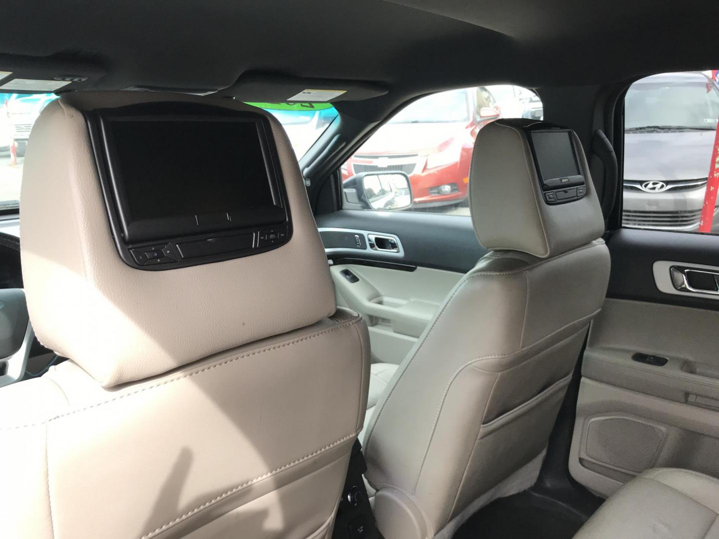 2013 Black /Black Ford Explorer Limited 4WD (1FM5K8F83DG) with an 3.5L V6 DOHC 24V engine, 6-Speed Automatic transmission, located at 577 Chester Pike, Prospect Park, PA, 19076, (610) 237-1015, 39.886154, -75.302338 - 2013 Ford Explorer LIMITED: 3rd row seating, 4x4, navigation system, backup camera, DVD's in rear headrests, new PA inspection, runs LIKE NEW! This vehicle comes inspected and has been given a bumper to bumper safety check. It is very clean, reliable, and well maintained. We offer a unique pay pl - Photo#20