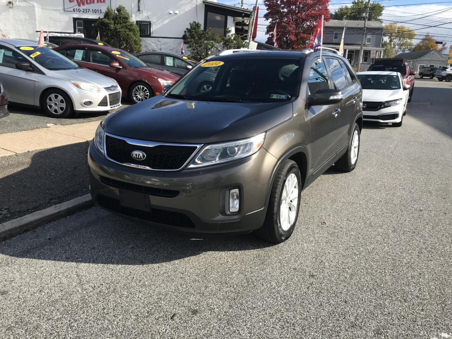 2014 Brown /Black Kia Sorento EX V6 AWD (5XYKUDA76EG) with an 3.3L V6 DOHC 24V engine, 6-Speed Automatic transmission, located at 577 Chester Pike, Prospect Park, PA, 19076, (610) 237-1015, 39.886154, -75.302338 - 2014 Kia Sorento EX: AWD, aftermarket screen radio, new PA inspection, SUPER CLEAN, runs LIKE NEW! This vehicle comes inspected and has been given a bumper to bumper safety check. It is very clean, reliable, and well maintained. We offer a unique pay plan that is known for being the easiest and f - Photo#2