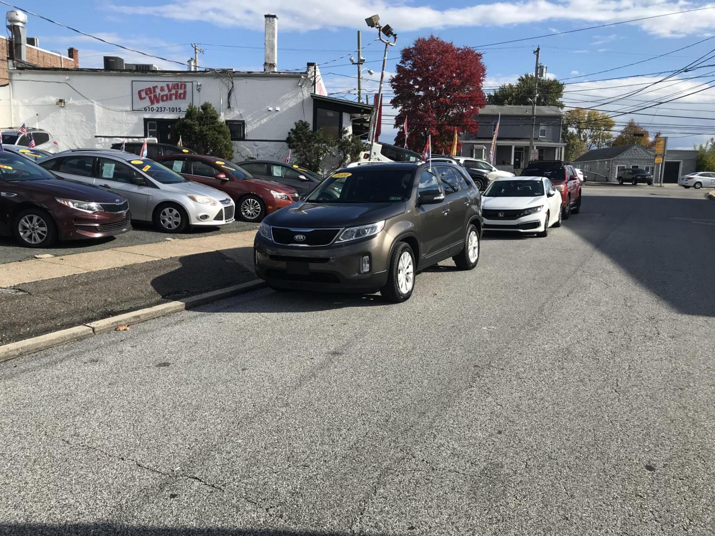 2014 Brown /Black Kia Sorento EX V6 AWD (5XYKUDA76EG) with an 3.3L V6 DOHC 24V engine, 6-Speed Automatic transmission, located at 577 Chester Pike, Prospect Park, PA, 19076, (610) 237-1015, 39.886154, -75.302338 - 2014 Kia Sorento EX: AWD, aftermarket screen radio, new PA inspection, SUPER CLEAN, runs LIKE NEW! This vehicle comes inspected and has been given a bumper to bumper safety check. It is very clean, reliable, and well maintained. We offer a unique pay plan that is known for being the easiest and f - Photo#1