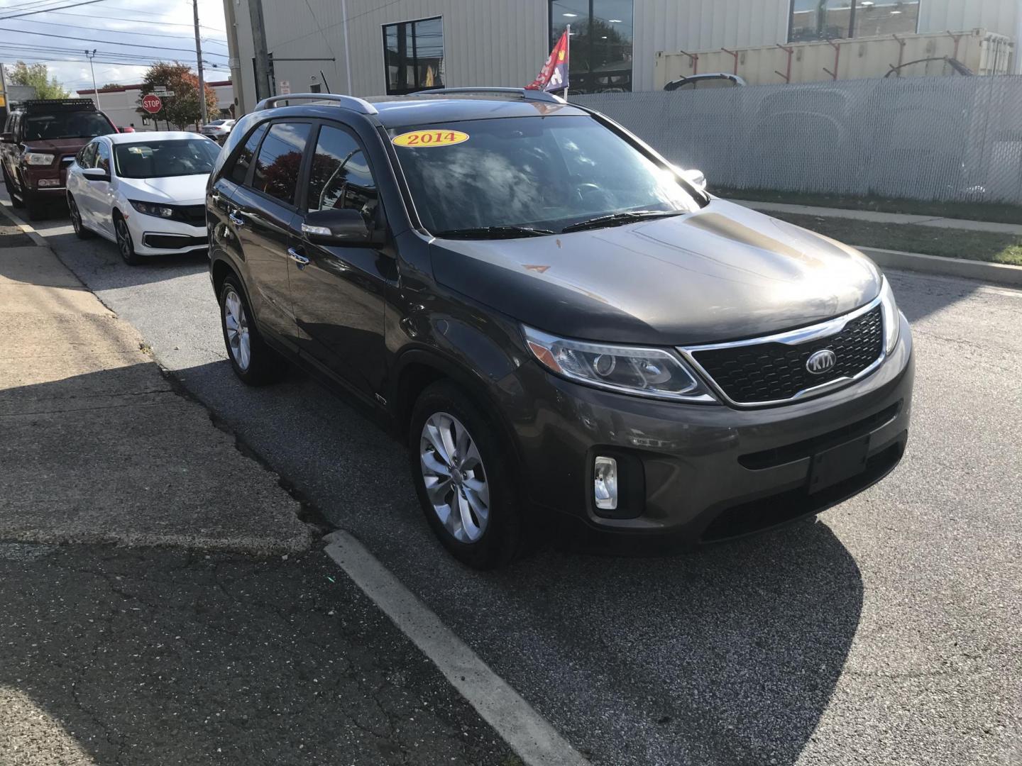 2014 Brown /Black Kia Sorento EX V6 AWD (5XYKUDA76EG) with an 3.3L V6 DOHC 24V engine, 6-Speed Automatic transmission, located at 577 Chester Pike, Prospect Park, PA, 19076, (610) 237-1015, 39.886154, -75.302338 - 2014 Kia Sorento EX: AWD, aftermarket screen radio, new PA inspection, SUPER CLEAN, runs LIKE NEW! This vehicle comes inspected and has been given a bumper to bumper safety check. It is very clean, reliable, and well maintained. We offer a unique pay plan that is known for being the easiest and f - Photo#3