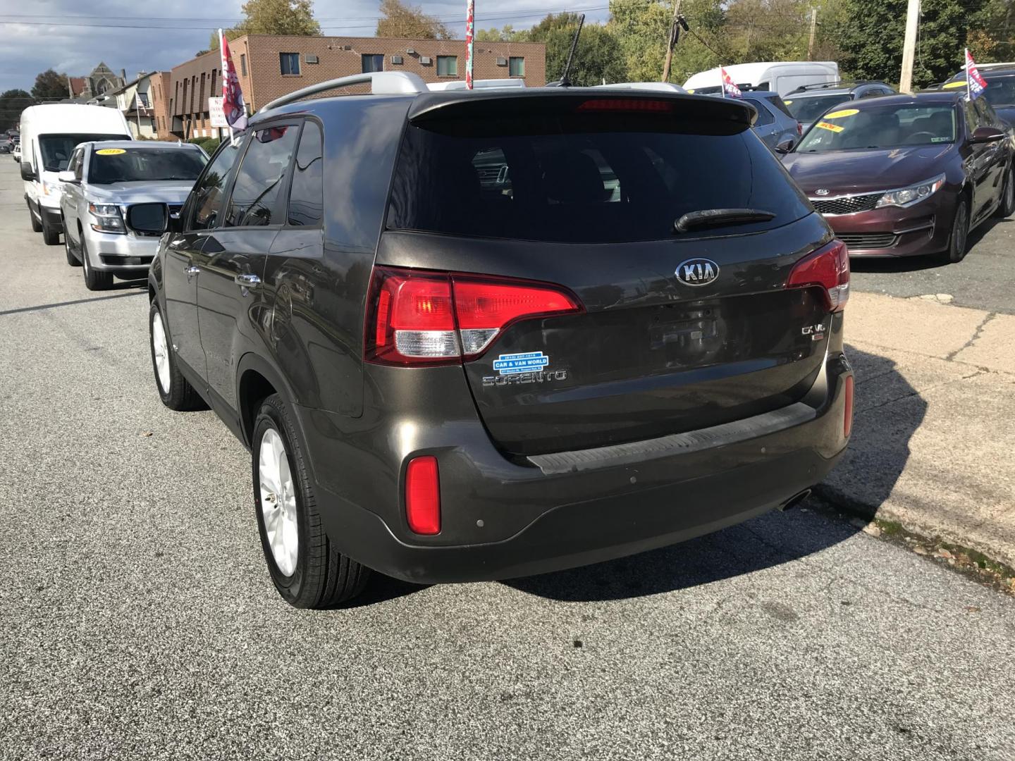 2014 Brown /Black Kia Sorento EX V6 AWD (5XYKUDA76EG) with an 3.3L V6 DOHC 24V engine, 6-Speed Automatic transmission, located at 577 Chester Pike, Prospect Park, PA, 19076, (610) 237-1015, 39.886154, -75.302338 - 2014 Kia Sorento EX: AWD, aftermarket screen radio, new PA inspection, SUPER CLEAN, runs LIKE NEW! This vehicle comes inspected and has been given a bumper to bumper safety check. It is very clean, reliable, and well maintained. We offer a unique pay plan that is known for being the easiest and f - Photo#5