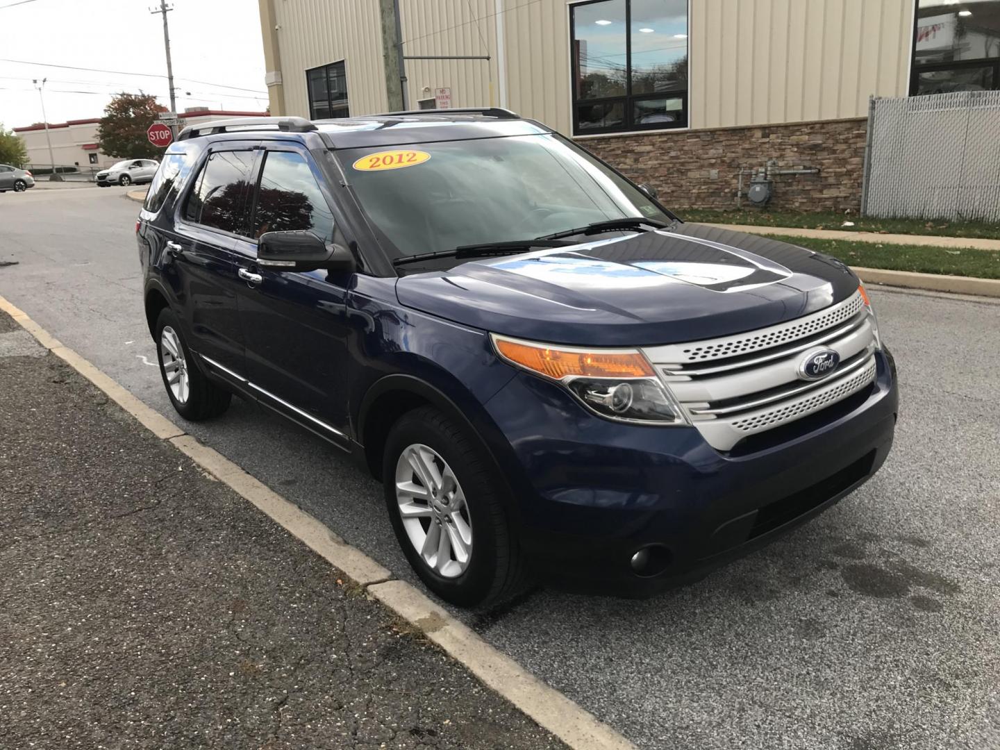 2012 Blue /Black Ford Explorer XLT 4WD (1FMHK8D88CG) with an 3.5L V6 DOHC 24V engine, 6-Speed Automatic transmission, located at 577 Chester Pike, Prospect Park, PA, 19076, (610) 237-1015, 39.886154, -75.302338 - 2012 Ford Explorer XLT: Navigation system, backup camera, 4x4, 3rd row seating, new PA inspection, SUPER CLEAN, runs LIKE NEW! This vehicle comes inspected and has been given a bumper to bumper safety check. It is very clean, reliable, and well maintained. We offer a unique pay plan that is known - Photo#3