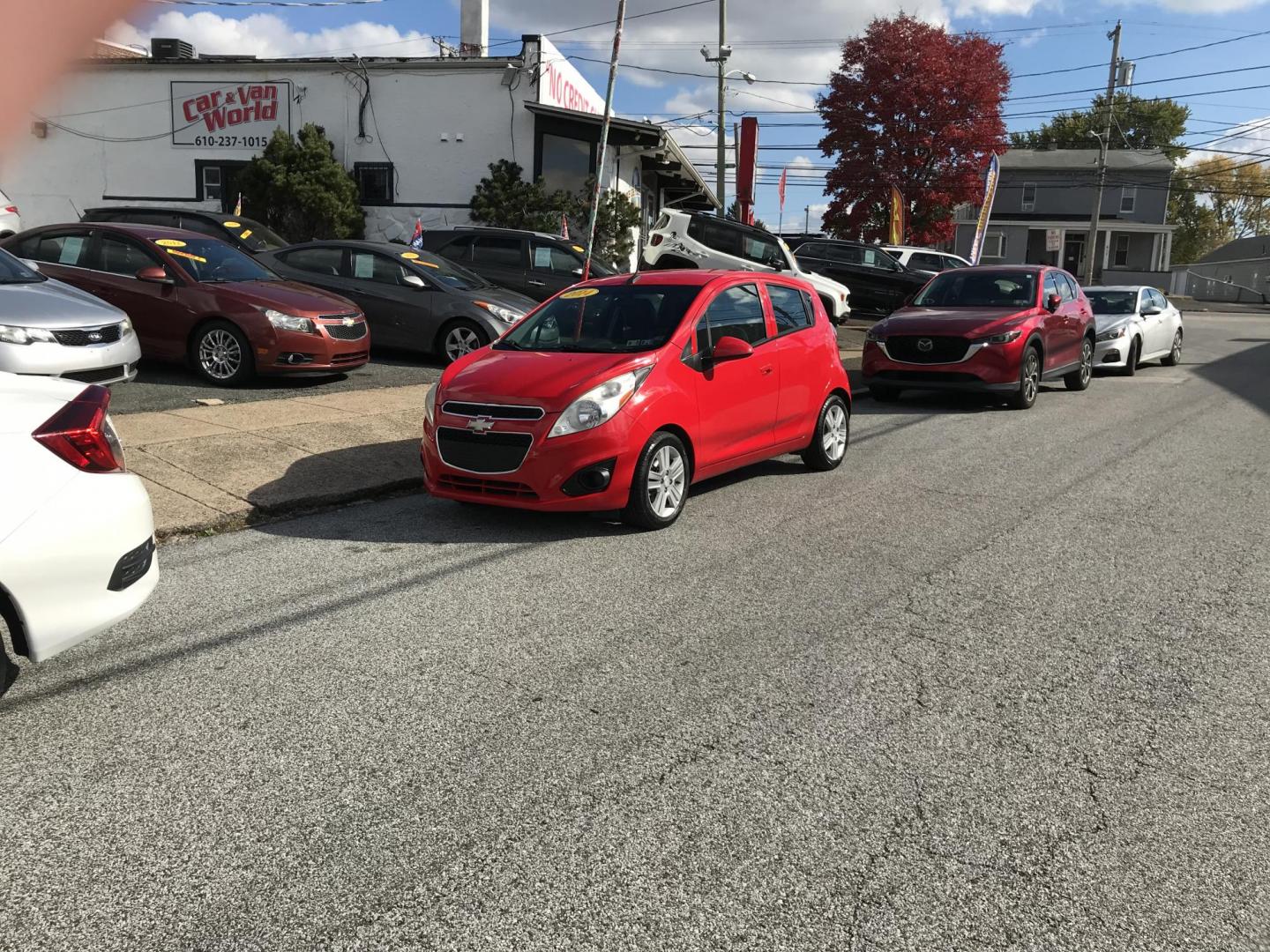 2014 Red /Black Chevrolet Spark LS Auto (KL8CB6S90EC) with an 1.2L L4 16V DOHC engine, Continuously Variable Transmission transmission, located at 577 Chester Pike, Prospect Park, PA, 19076, (610) 237-1015, 39.886154, -75.302338 - 2014 Chevy Spark LS: Only 76k miles, new PA inspection, great on gas, runs LIKE NEW! This vehicle comes inspected and has been given a bumper to bumper safety check. It is very clean, reliable, and well maintained. We offer a unique pay plan that is known for being the easiest and fastest financi - Photo#1