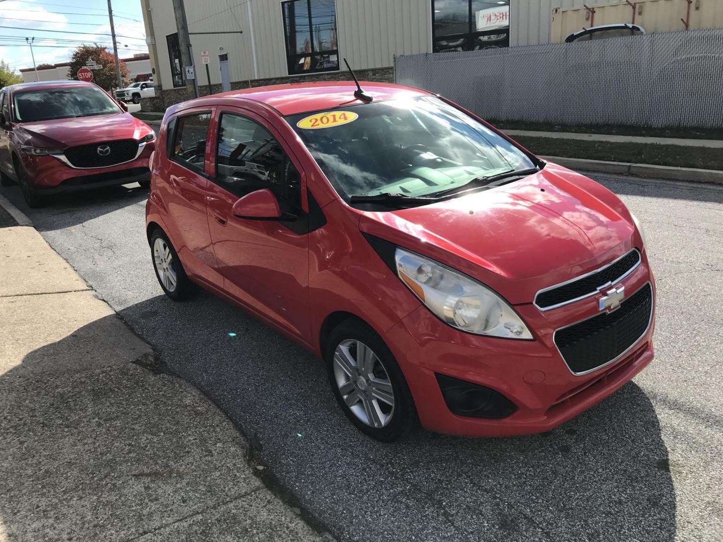2014 Red /Black Chevrolet Spark LS Auto (KL8CB6S90EC) with an 1.2L L4 16V DOHC engine, Continuously Variable Transmission transmission, located at 577 Chester Pike, Prospect Park, PA, 19076, (610) 237-1015, 39.886154, -75.302338 - 2014 Chevy Spark LS: Only 76k miles, new PA inspection, great on gas, runs LIKE NEW! This vehicle comes inspected and has been given a bumper to bumper safety check. It is very clean, reliable, and well maintained. We offer a unique pay plan that is known for being the easiest and fastest financi - Photo#3