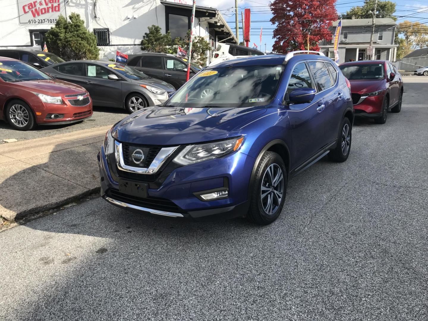 2017 Blue /Black Nissan Rogue SL AWD (JN8AT2MV2HW) with an 2.5L L4 DOHC 16V engine, CVT transmission, located at 577 Chester Pike, Prospect Park, PA, 19076, (610) 237-1015, 39.886154, -75.302338 - 2017 Nissan Rogue SL: Only 114k miles, panoramic sunroof, backup camera, navigation system, AWD, SUPER CLEAN, runs LIKE NEW! This vehicle comes inspected and has been given a bumper to bumper safety check. It is very clean, reliable, and well maintained. We offer a unique pay plan that is known f - Photo#2
