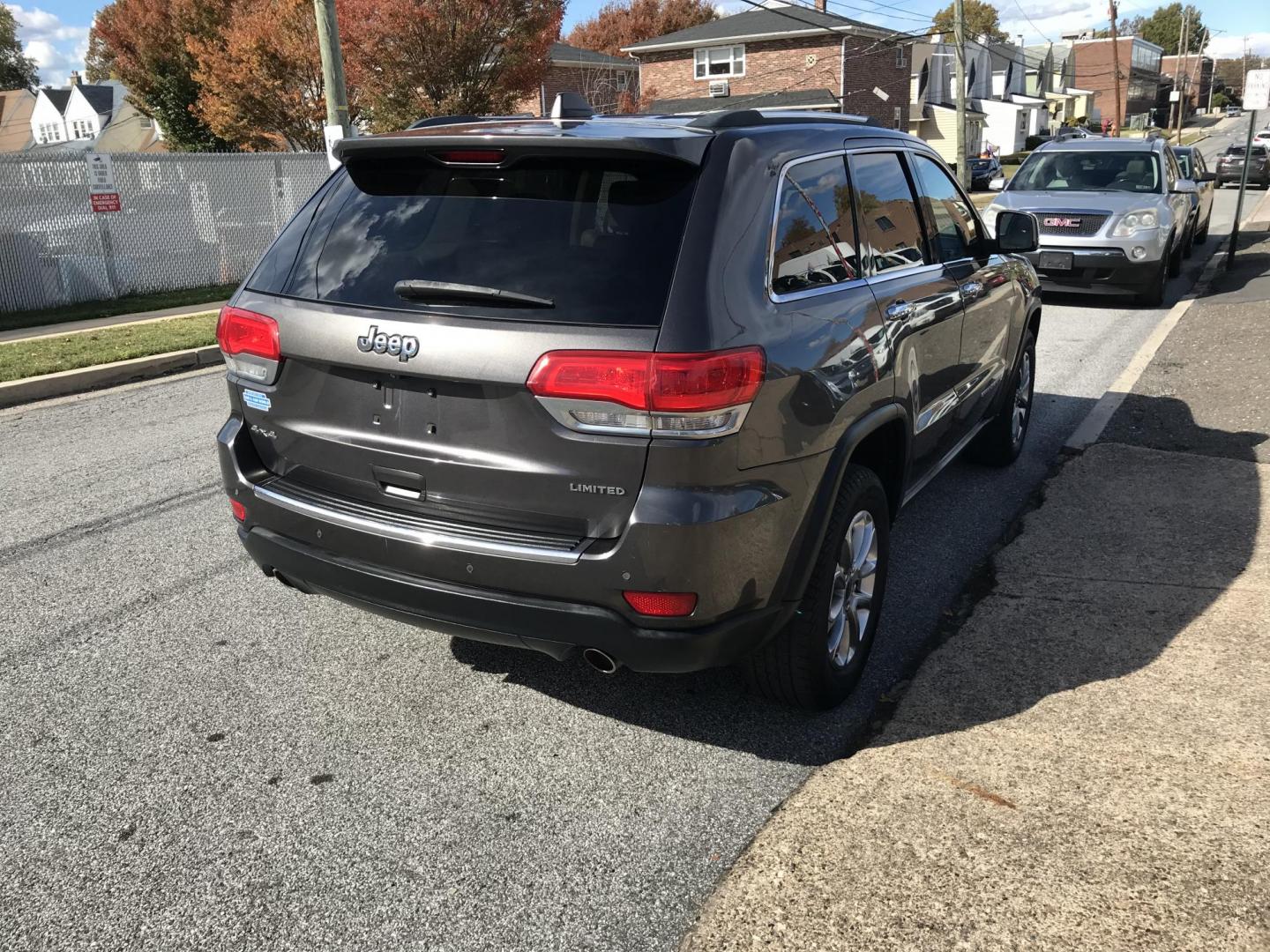 2014 Gray /Tan Jeep Grand Cherokee Limited 4WD (1C4RJFBG4EC) with an 3.6L V6 DOHC 24V engine, 5-Speed Automatic transmission, located at 577 Chester Pike, Prospect Park, PA, 19076, (610) 237-1015, 39.886154, -75.302338 - 2014 Jeep Grand Cherokee LIMITED: Navigation system, backup camera, sunroof, 4x4, new PA inspection, SUPER CLEAN, runs LIKE NEW! This vehicle comes inspected and has been given a bumper to bumper safety check. It is very clean, reliable, and well maintained. We offer a unique pay plan that is kno - Photo#4
