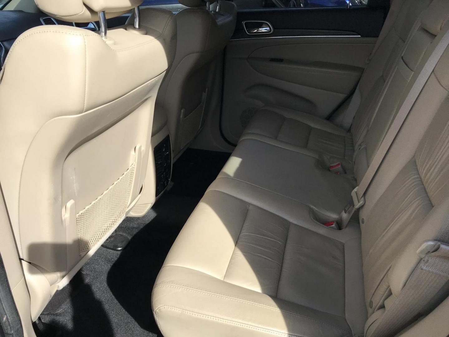 2014 Gray /Tan Jeep Grand Cherokee Limited 4WD (1C4RJFBG4EC) with an 3.6L V6 DOHC 24V engine, 5-Speed Automatic transmission, located at 577 Chester Pike, Prospect Park, PA, 19076, (610) 237-1015, 39.886154, -75.302338 - 2014 Jeep Grand Cherokee LIMITED: Navigation system, backup camera, sunroof, 4x4, new PA inspection, SUPER CLEAN, runs LIKE NEW! This vehicle comes inspected and has been given a bumper to bumper safety check. It is very clean, reliable, and well maintained. We offer a unique pay plan that is kno - Photo#17