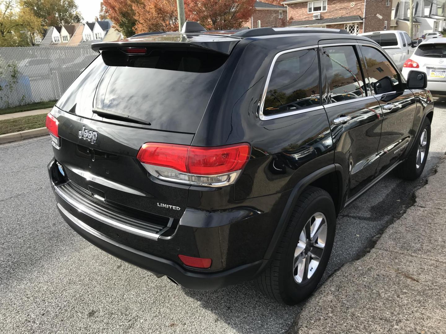 2014 Black /Black Jeep Grand Cherokee Limited 4WD (1C4RJFBG5EC) with an 3.6L V6 DOHC 24V engine, 5-Speed Automatic transmission, located at 577 Chester Pike, Prospect Park, PA, 19076, (610) 237-1015, 39.886154, -75.302338 - 2014 Jeep Grand Cherokee LIMITED: Backup camera, 4x4, sunroof, fully loaded, new PA inspection, looks and runs LIKE NEW! This vehicle comes inspected and has been given a bumper to bumper safety check. It is very clean, reliable, and well maintained. We offer a unique pay plan that is known for b - Photo#4
