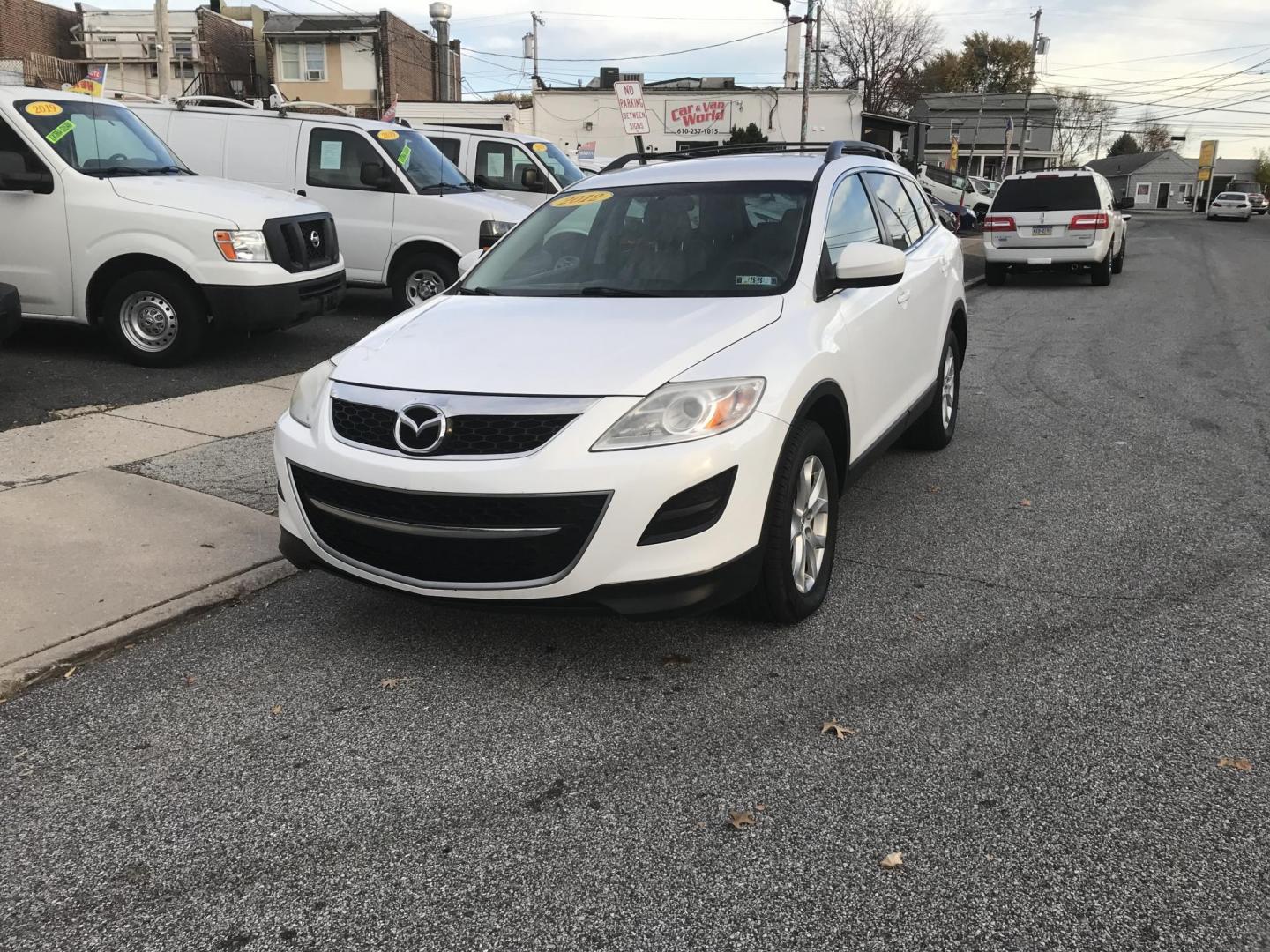 2012 White /Beige Mazda CX-9 Touring AWD (JM3TB3CV0C0) with an 3.7L V6 DOHC 24V engine, 6-Speed Automatic transmission, located at 577 Chester Pike, Prospect Park, PA, 19076, (610) 237-1015, 39.886154, -75.302338 - Photo#2