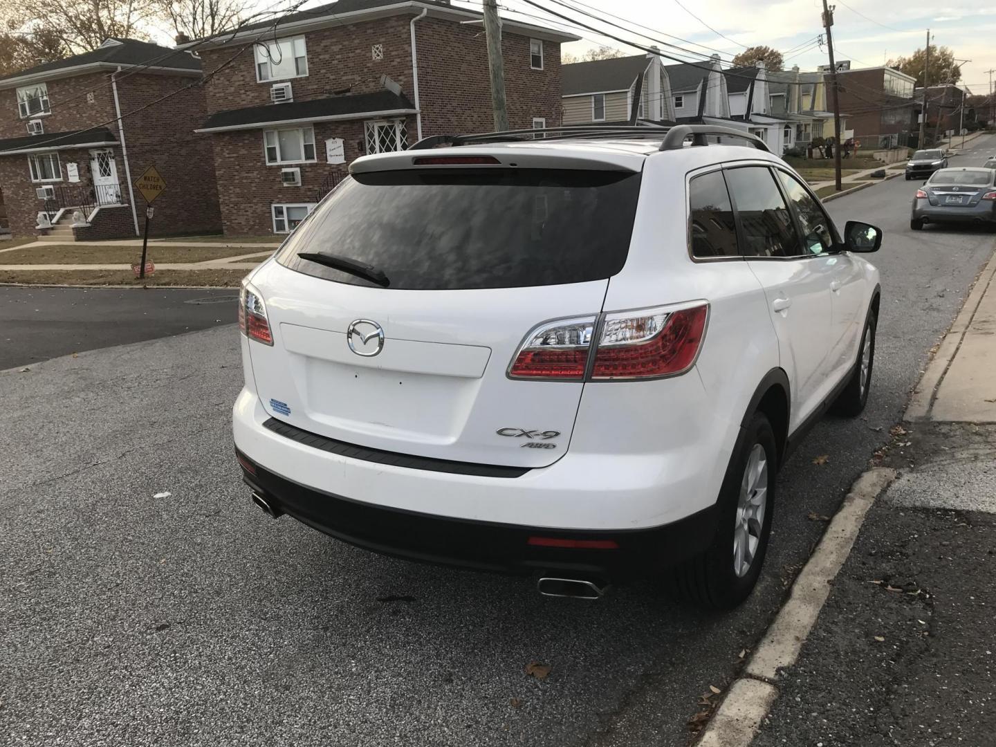 2012 White /Beige Mazda CX-9 Touring AWD (JM3TB3CV0C0) with an 3.7L V6 DOHC 24V engine, 6-Speed Automatic transmission, located at 577 Chester Pike, Prospect Park, PA, 19076, (610) 237-1015, 39.886154, -75.302338 - Photo#4