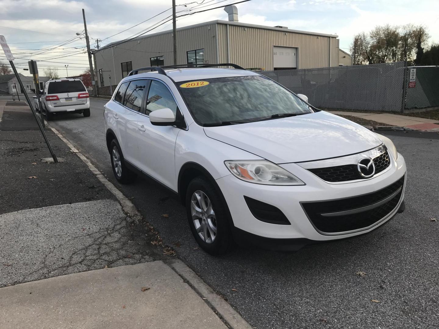 2012 White /Beige Mazda CX-9 Touring AWD (JM3TB3CV0C0) with an 3.7L V6 DOHC 24V engine, 6-Speed Automatic transmission, located at 577 Chester Pike, Prospect Park, PA, 19076, (610) 237-1015, 39.886154, -75.302338 - Photo#3