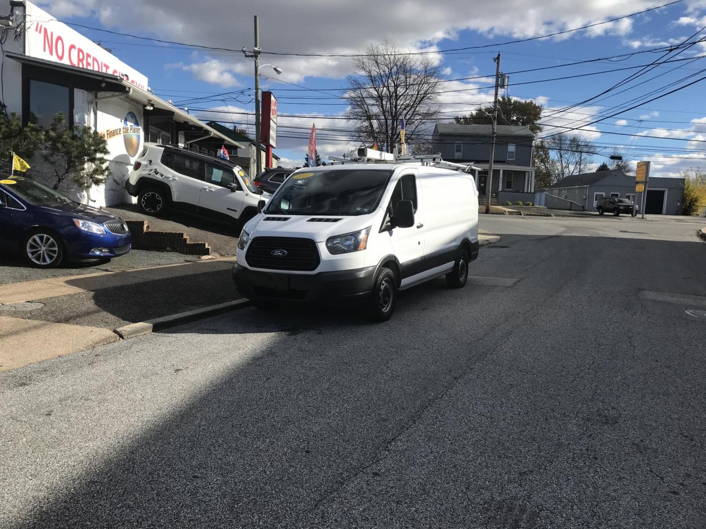 2017 White /Gray Ford Transit 150 Van Low Roof 60/40 Pass. 130-in. WB (1FTYE1ZM6HK) with an 3.7L V6 DOHC 24V engine, 6A transmission, located at 577 Chester Pike, Prospect Park, PA, 19076, (610) 237-1015, 39.886154, -75.302338 - Photo#1