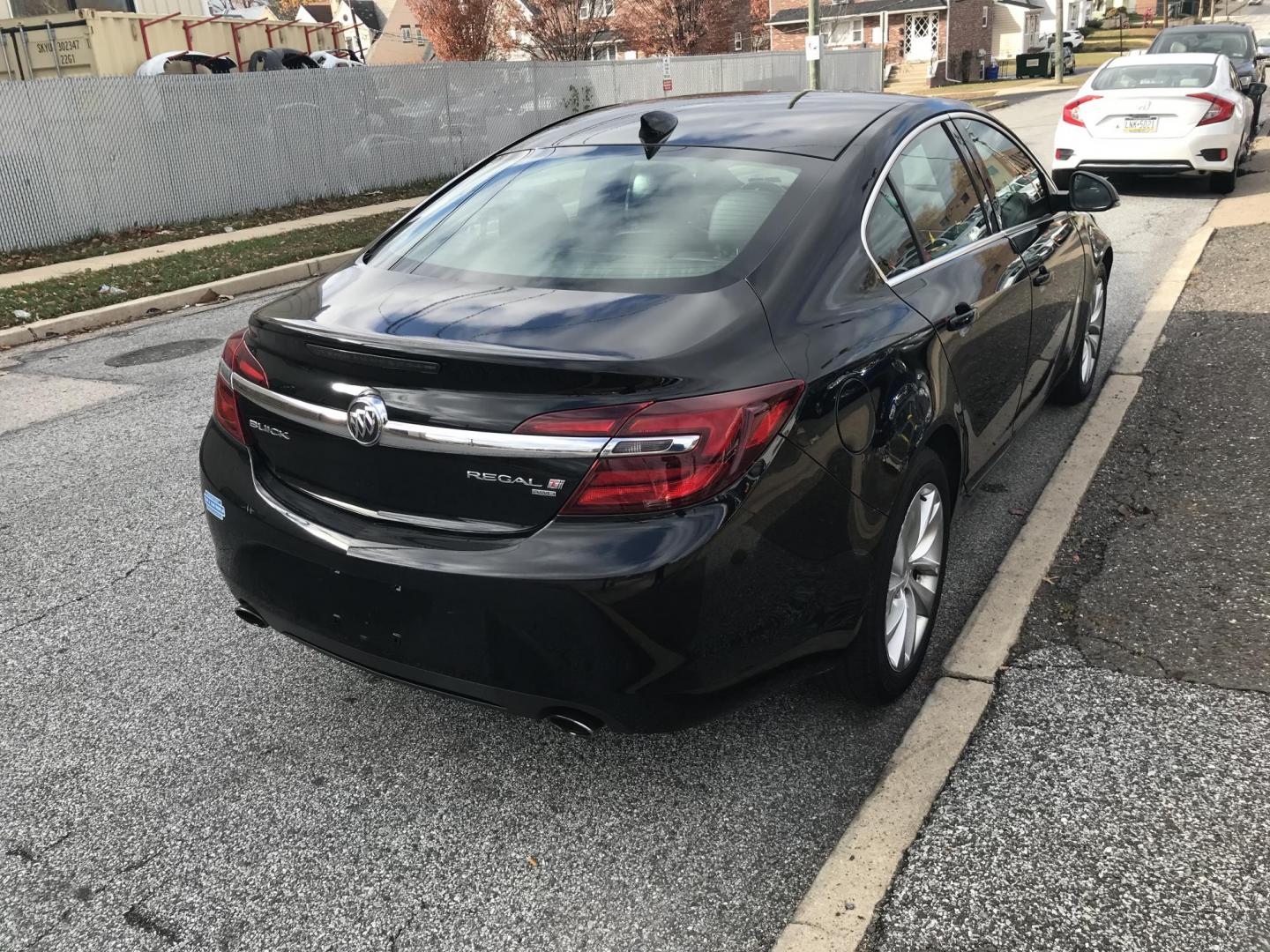 2017 Black /Black Buick Regal Leather AWD (2G4GM5EX9H9) with an 2.0L L4 DOHC 16V TURBO engine, 6A transmission, located at 577 Chester Pike, Prospect Park, PA, 19076, (610) 237-1015, 39.886154, -75.302338 - Photo#4