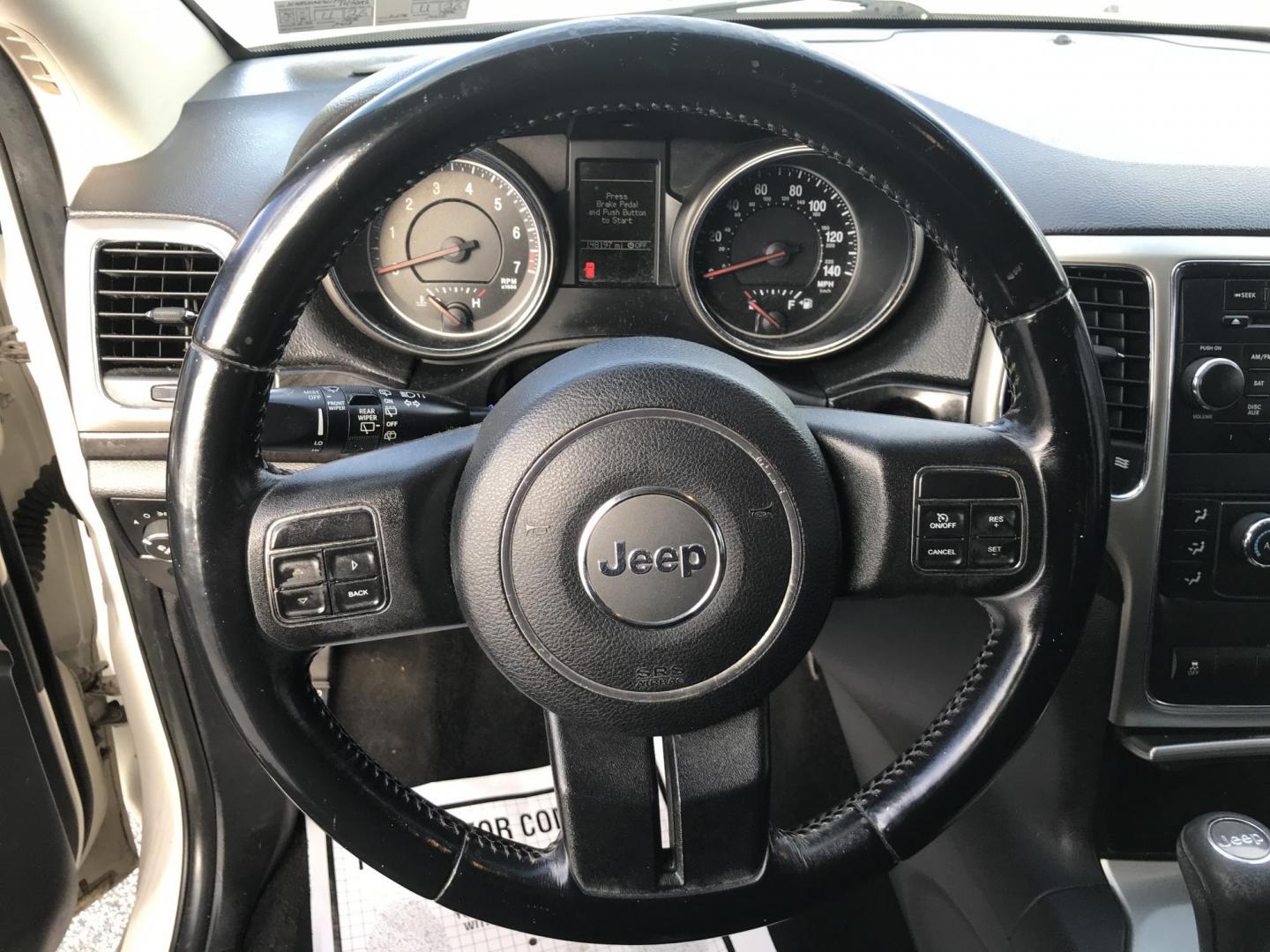 2012 White /Black Jeep Grand Cherokee Laredo 4WD (1C4RJFAG3CC) with an 3.6L V6 DOHC 24V engine, 5-Speed Automatic transmission, located at 577 Chester Pike, Prospect Park, PA, 19076, (610) 237-1015, 39.886154, -75.302338 - Photo#11