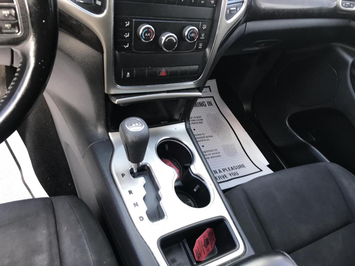 2012 White /Black Jeep Grand Cherokee Laredo 4WD (1C4RJFAG3CC) with an 3.6L V6 DOHC 24V engine, 5-Speed Automatic transmission, located at 577 Chester Pike, Prospect Park, PA, 19076, (610) 237-1015, 39.886154, -75.302338 - Photo#13