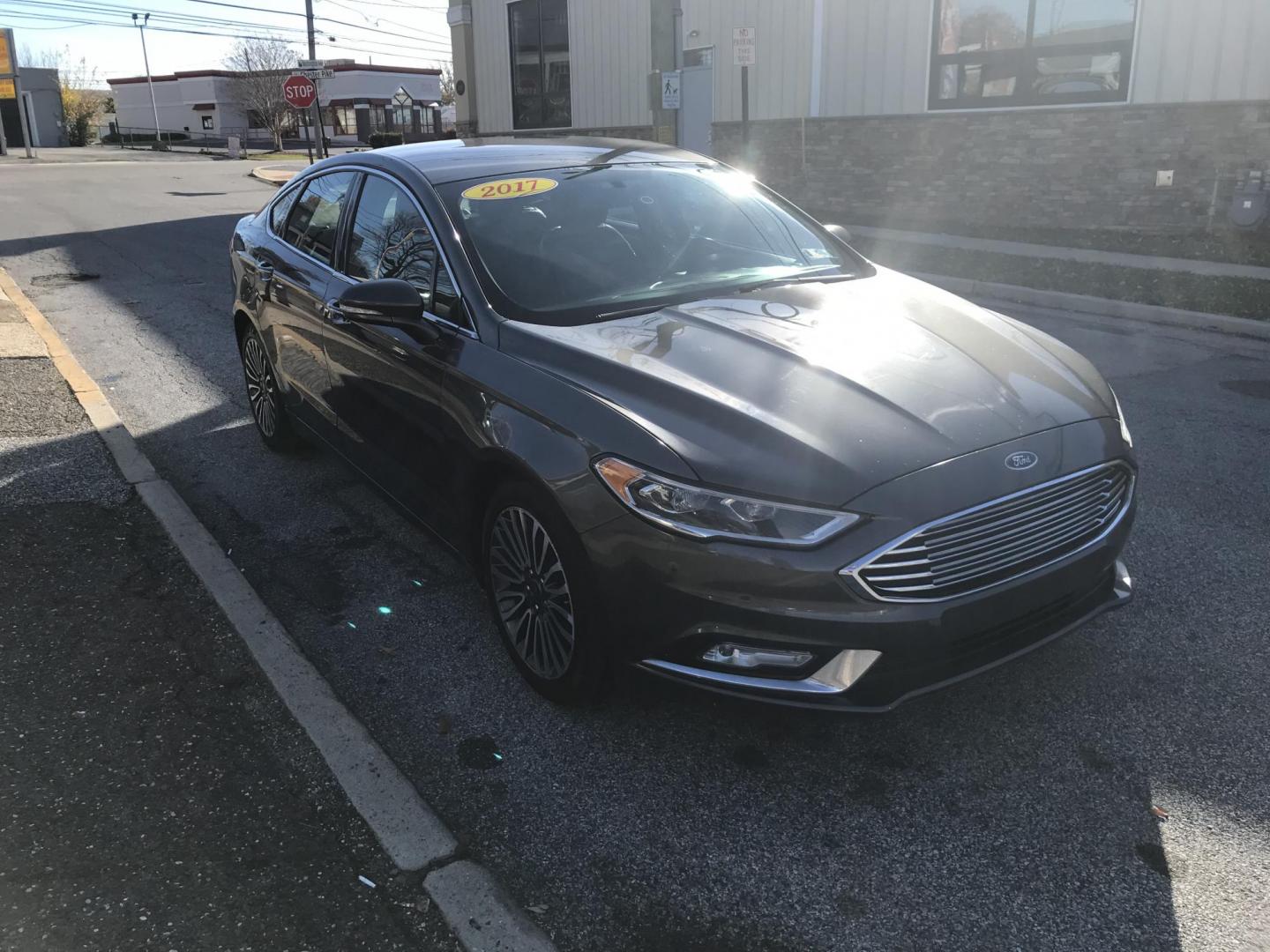 2017 Gray /Black Ford Fusion SE (3FA6P0H96HR) with an 2.0L L4 DOHC 16V engine, 6A transmission, located at 577 Chester Pike, Prospect Park, PA, 19076, (610) 237-1015, 39.886154, -75.302338 - Photo#1