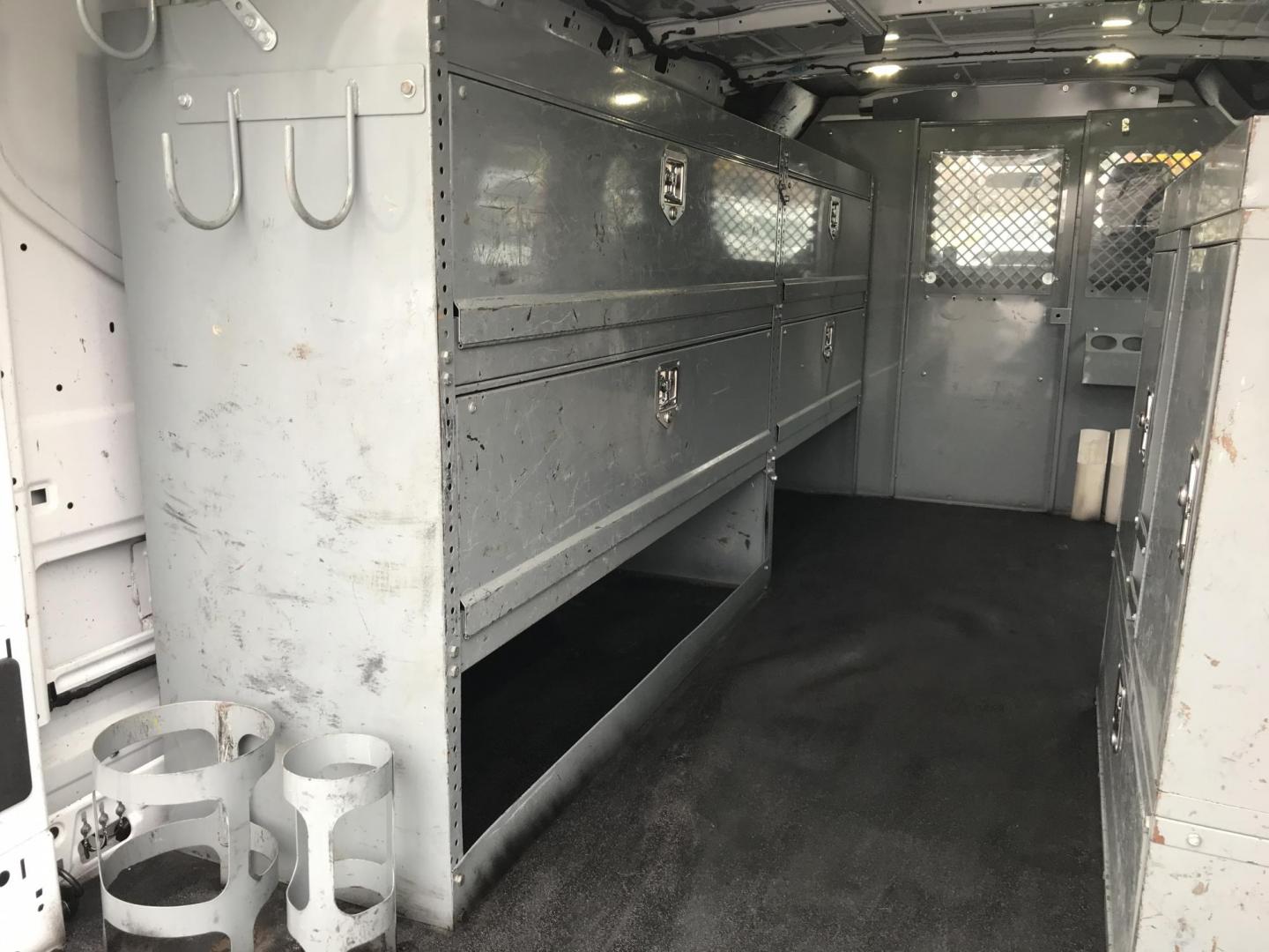 2015 White /Gray Ford Transit 250 Van Low Roof 60/40 Pass. 148-in. WB (1FTNR2ZM8FK) with an 3.7L V6 DOHC 24V engine, 6A transmission, located at 577 Chester Pike, Prospect Park, PA, 19076, (610) 237-1015, 39.886154, -75.302338 - 2015 Ford Transit 250: Extended wheelbase, multiple pieces of shelving, partition, FLEET MAINTAINED, runs LIKE NEW! This vehicle comes inspected and has been given a bumper to bumper safety check. It is very clean, reliable, and well maintained. We offer a unique pay plan that is known for being - Photo#17