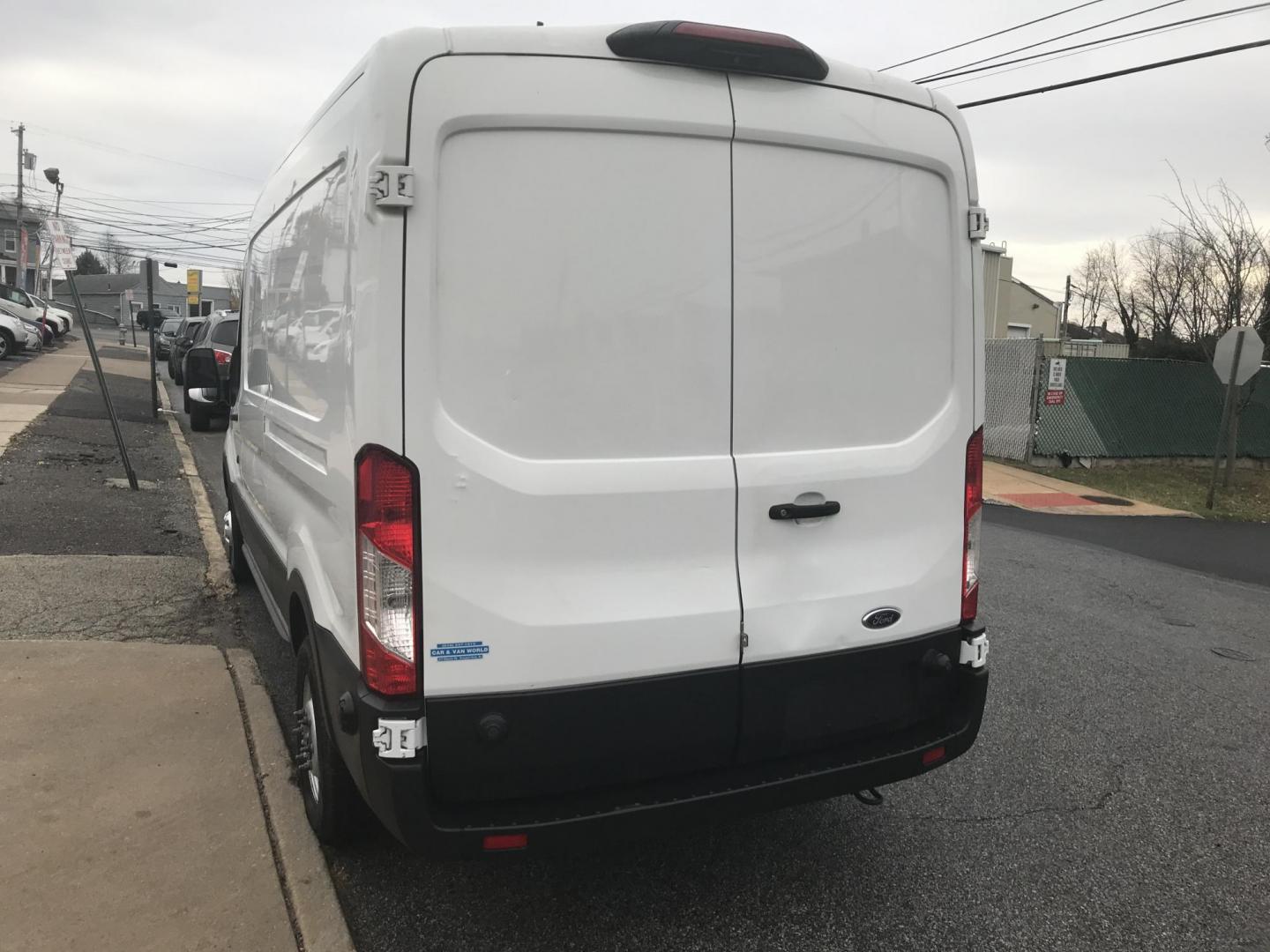 2020 White /Gray Ford Transit 250 Van Med. Roof w/Sliding Pass. 148-in. WB (1FTBR2C82LK) with an 3.5L V6 DOHC 24V engine, 6A transmission, located at 577 Chester Pike, Prospect Park, PA, 19076, (610) 237-1015, 39.886154, -75.302338 - 2020 Ford Transit Medium Roof: Has multiple pieces of shelving, backup camera, partition, new PA inspection, FLEET MAINTAINED This vehicle comes inspected and has been given a bumper to bumper safety check. It is very clean, reliable, and well maintained. We offer a unique pay plan that is known - Photo#5
