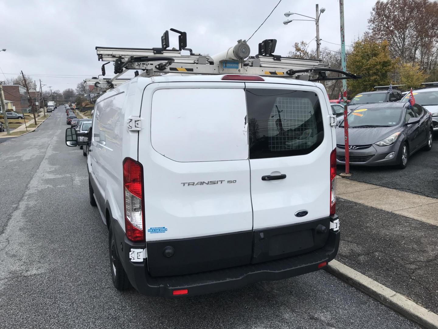 2018 White /Gray Ford Transit 150 Van Low Roof w/Sliding Pass. 148-in. WB (1FTYE2YM2JK) with an 3.7L V6 DOHC 24V engine, 6A transmission, located at 577 Chester Pike, Prospect Park, PA, 19076, (610) 237-1015, 39.886154, -75.302338 - Photo#4