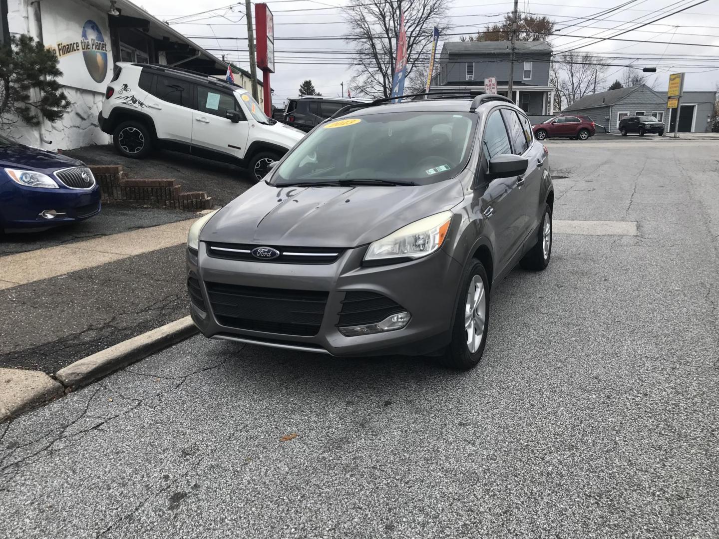 2013 Gray /Gray Ford Escape SE FWD (1FMCU0G95DU) with an 2.0L L4 DOHC 16V engine, 6-Speed Automatic transmission, located at 577 Chester Pike, Prospect Park, PA, 19076, (610) 237-1015, 39.886154, -75.302338 - 2013 Ford Escape: Only 125k miles, great on gas, new PA inspection, SUPER CLEAN, runs LIKE NEW! This vehicle comes inspected and has been given a bumper to bumper safety check. It is very clean, reliable, and well maintained. We offer a unique pay plan that is known for being the easiest and fast - Photo#2