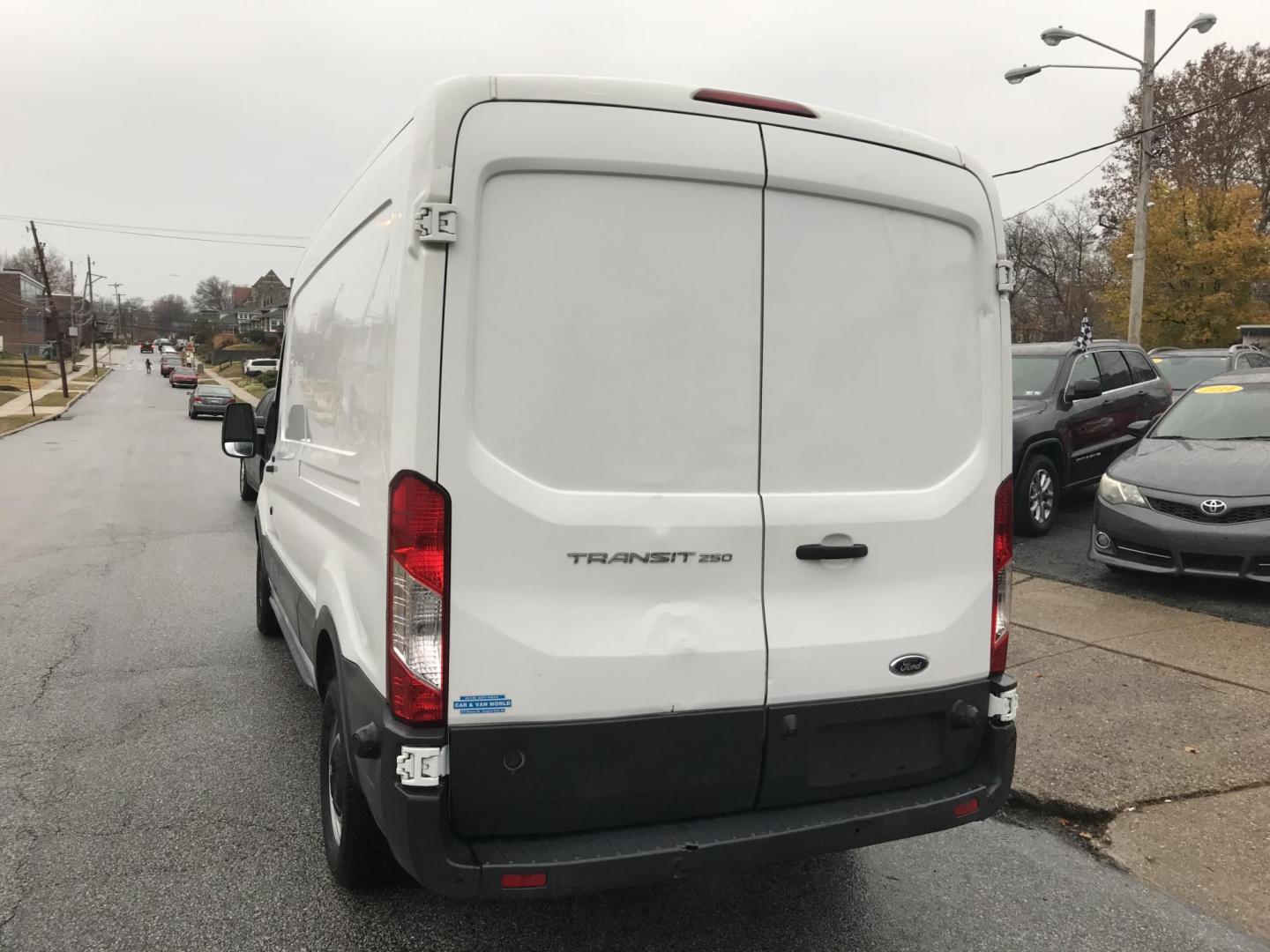 2017 White Ford Transit 250 Van Med. Roof w/Sliding Pass. 148-in. WB (1FTYR2CM0HK) with an 3.7L V6 DOHC 24V engine, 6A transmission, located at 577 Chester Pike, Prospect Park, PA, 19076, (610) 237-1015, 39.886154, -75.302338 - 2017 Ford Transit 250 Medium Roof: Only 139k miles, backup camera, shelving, FLEET MAINTAINED, runs LIKE NEW! This vehicle comes inspected and has been given a bumper to bumper safety check. It is very clean, reliable, and well maintained. We offer a unique pay plan that is known for being the ea - Photo#5
