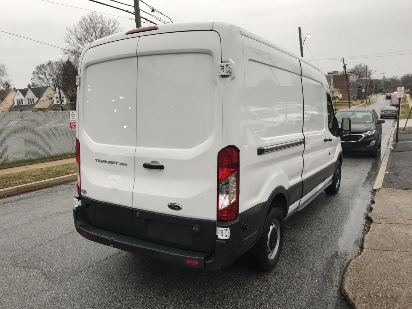 2017 White Ford Transit 250 Van Med. Roof w/Sliding Pass. 148-in. WB (1FTYR2CM0HK) with an 3.7L V6 DOHC 24V engine, 6A transmission, located at 577 Chester Pike, Prospect Park, PA, 19076, (610) 237-1015, 39.886154, -75.302338 - 2017 Ford Transit 250 Medium Roof: Only 139k miles, backup camera, shelving, FLEET MAINTAINED, runs LIKE NEW! This vehicle comes inspected and has been given a bumper to bumper safety check. It is very clean, reliable, and well maintained. We offer a unique pay plan that is known for being the ea - Photo#4