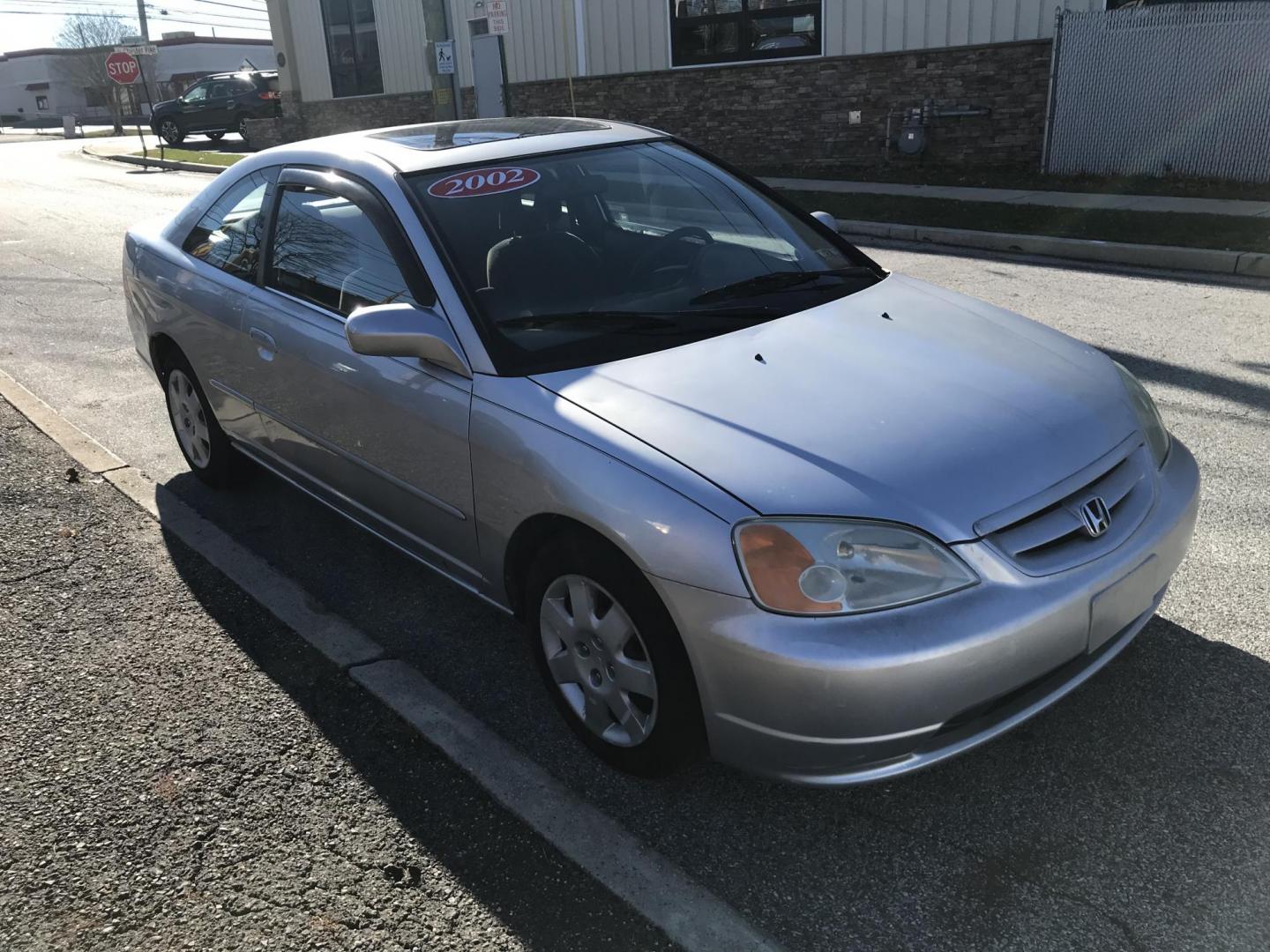 2002 Silver /Gray Honda Civic EX coupe (1HGEM22072L) with an 1.7L L4 SOHC 16V engine, 4-Speed Automatic Overdrive transmission, located at 577 Chester Pike, Prospect Park, PA, 19076, (610) 237-1015, 39.886154, -75.302338 - Photo#1