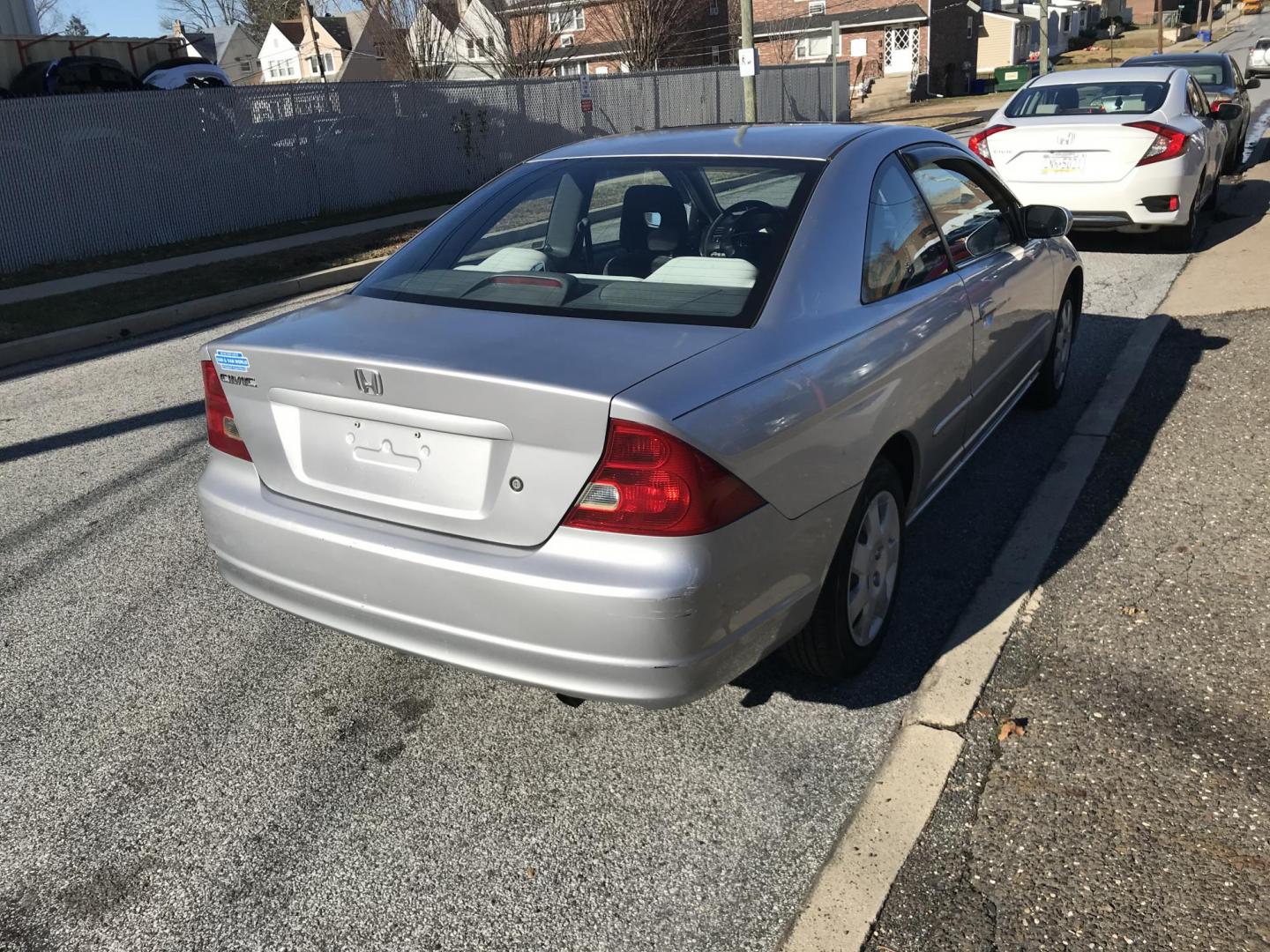 2002 Silver /Gray Honda Civic EX coupe (1HGEM22072L) with an 1.7L L4 SOHC 16V engine, 4-Speed Automatic Overdrive transmission, located at 577 Chester Pike, Prospect Park, PA, 19076, (610) 237-1015, 39.886154, -75.302338 - Photo#2