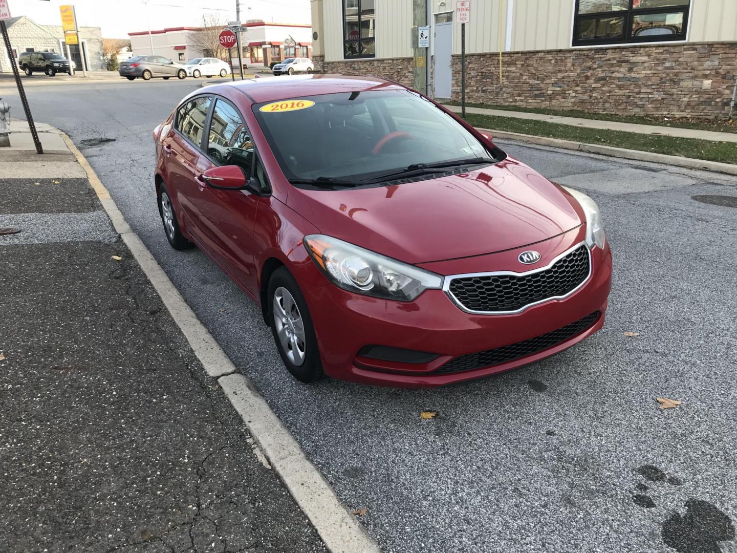 2016 Red /Gray Kia Forte EX (KNAFX4A64G5) with an 1.8L L4 DOHC 16V engine, 6-Speed Automatic transmission, located at 577 Chester Pike, Prospect Park, PA, 19076, (610) 237-1015, 39.886154, -75.302338 - Photo#3