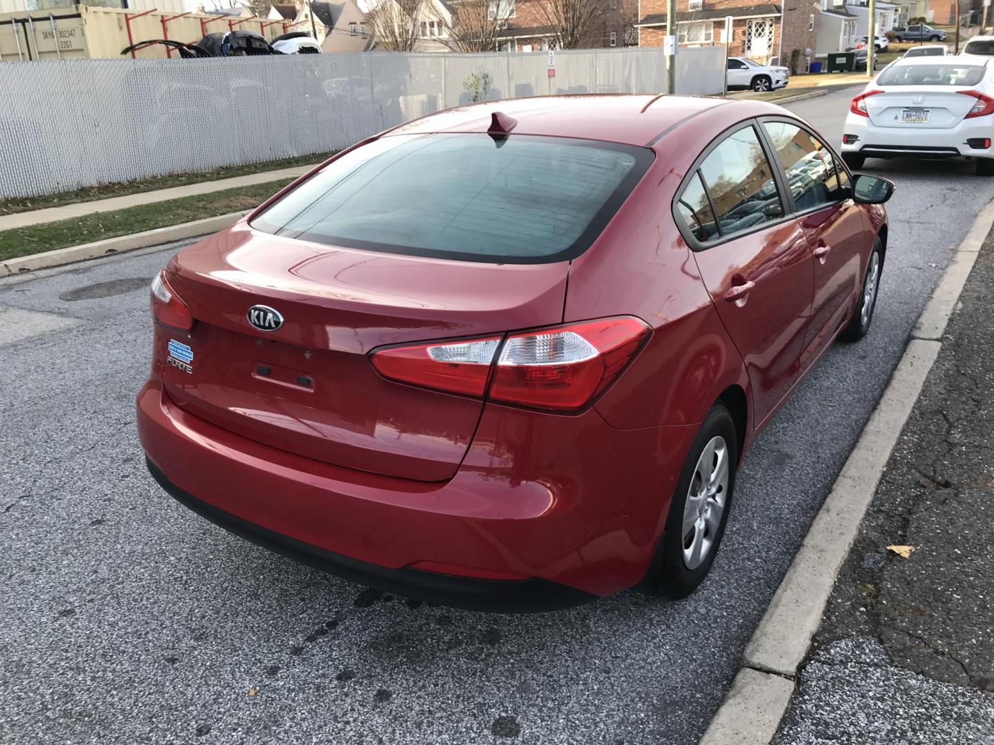 2016 Red /Gray Kia Forte EX (KNAFX4A64G5) with an 1.8L L4 DOHC 16V engine, 6-Speed Automatic transmission, located at 577 Chester Pike, Prospect Park, PA, 19076, (610) 237-1015, 39.886154, -75.302338 - Photo#4