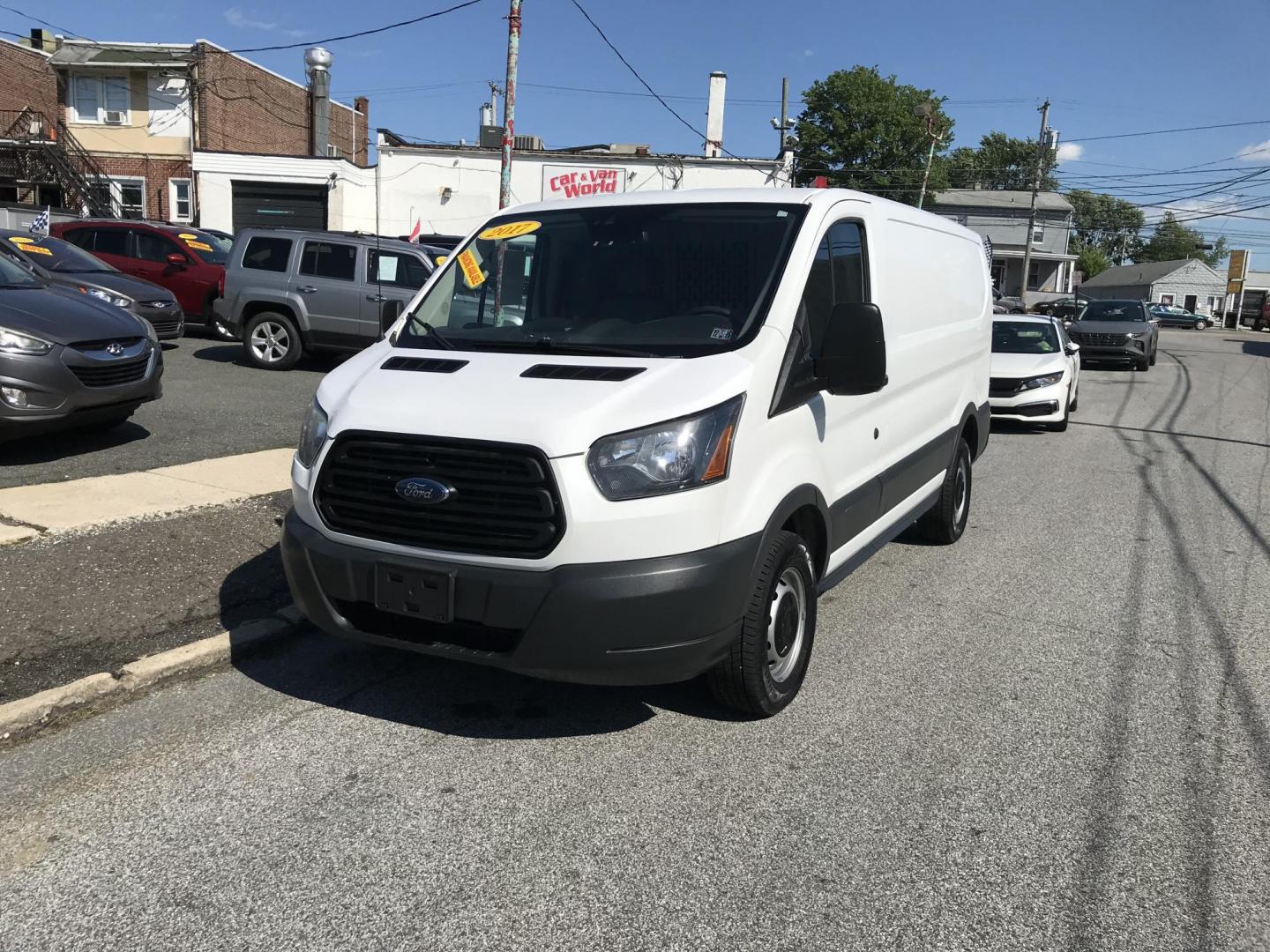 2017 White /Gray Ford Transit 250 Van Low Roof w/Sliding Pass. 130-in. WB (1FTYR1YM0HK) with an 3.7L V6 DOHC 24V engine, 6A transmission, located at 577 Chester Pike, Prospect Park, PA, 19076, (610) 237-1015, 39.886154, -75.302338 - 2017 Ford Transit 250 Low Roof: Only 128k miles, shelving, backup camera, new PA inspection, FLEET MAINTAINED, runs LIKE NEW! This vehicle comes inspected and has been given a bumper to bumper safety check. It is very clean, reliable, and well maintained. We offer a unique pay plan that is known - Photo#2