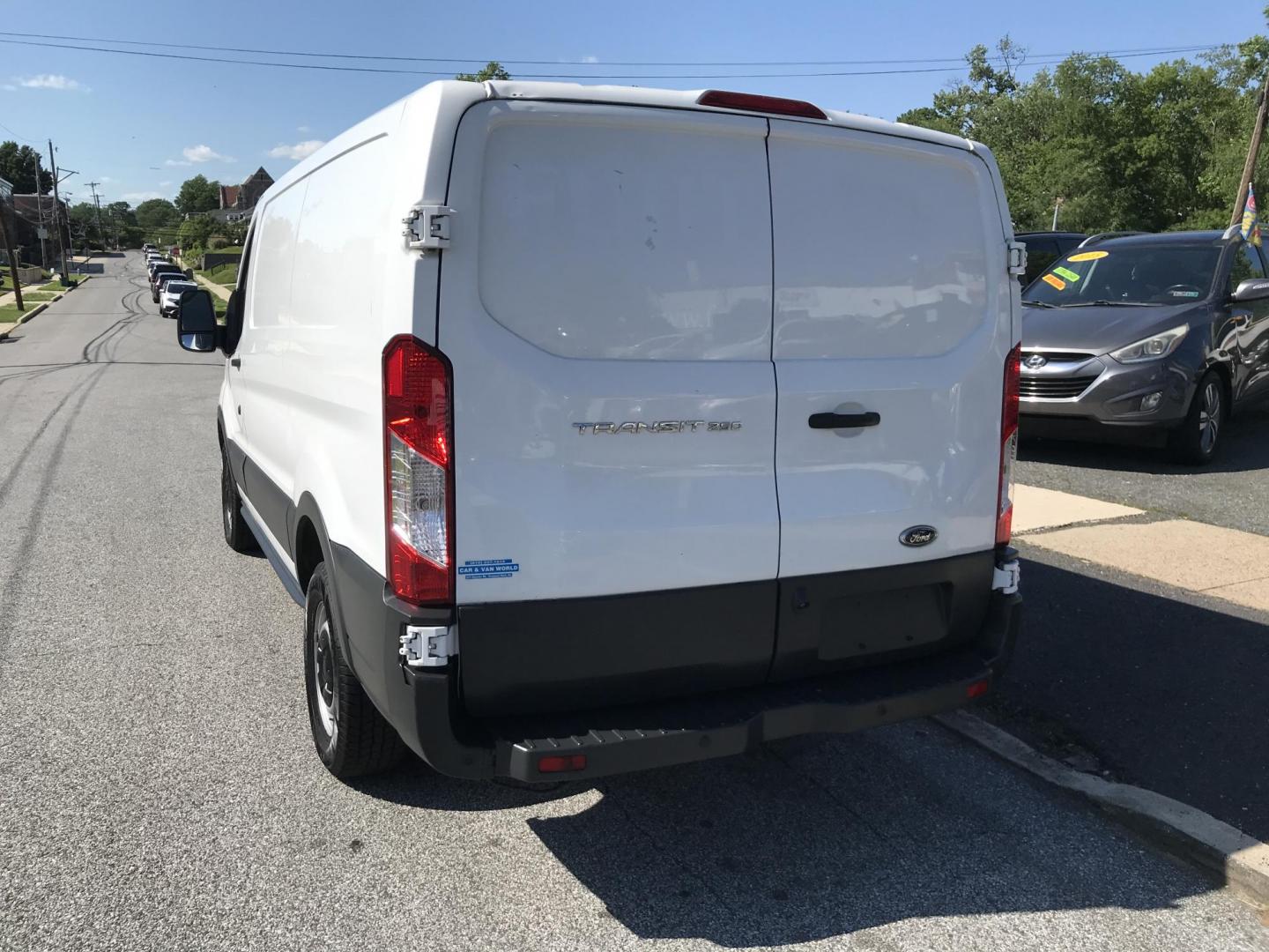 2017 White /Gray Ford Transit 250 Van Low Roof w/Sliding Pass. 130-in. WB (1FTYR1YM0HK) with an 3.7L V6 DOHC 24V engine, 6A transmission, located at 577 Chester Pike, Prospect Park, PA, 19076, (610) 237-1015, 39.886154, -75.302338 - 2017 Ford Transit 250 Low Roof: Only 128k miles, shelving, backup camera, new PA inspection, FLEET MAINTAINED, runs LIKE NEW! This vehicle comes inspected and has been given a bumper to bumper safety check. It is very clean, reliable, and well maintained. We offer a unique pay plan that is known - Photo#5