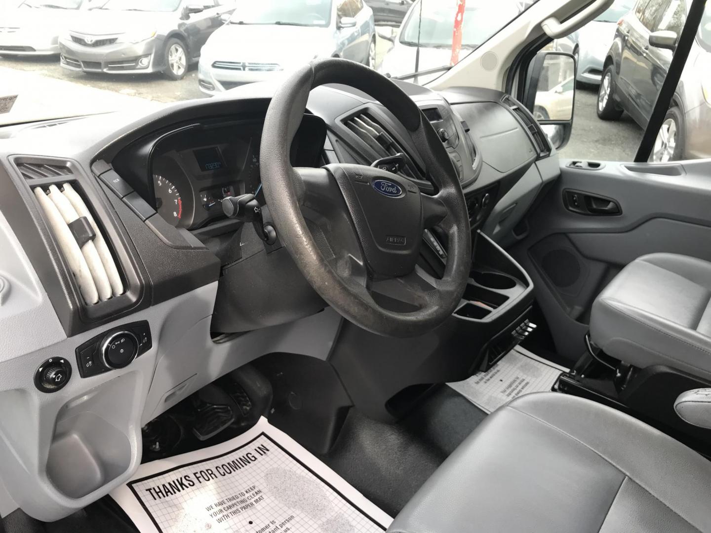 2017 White /Gray Ford Transit 150 Van Low Roof w/Sliding Pass. 130-in. WB (1FTYE1YM2HK) with an 3.7L V6 DOHC 24V engine, 6A transmission, located at 577 Chester Pike, Prospect Park, PA, 19076, (610) 237-1015, 39.886154, -75.302338 - 2017 Ford Transit 150: Double drop down ladder racks, shelving, backup camera, partition, new PA inspection, FLEET MAINTAINED, runs LIKE NEW! This vehicle comes inspected and has been given a bumper to bumper safety check. It is very clean, reliable, and well maintained. We offer a unique pay pla - Photo#11
