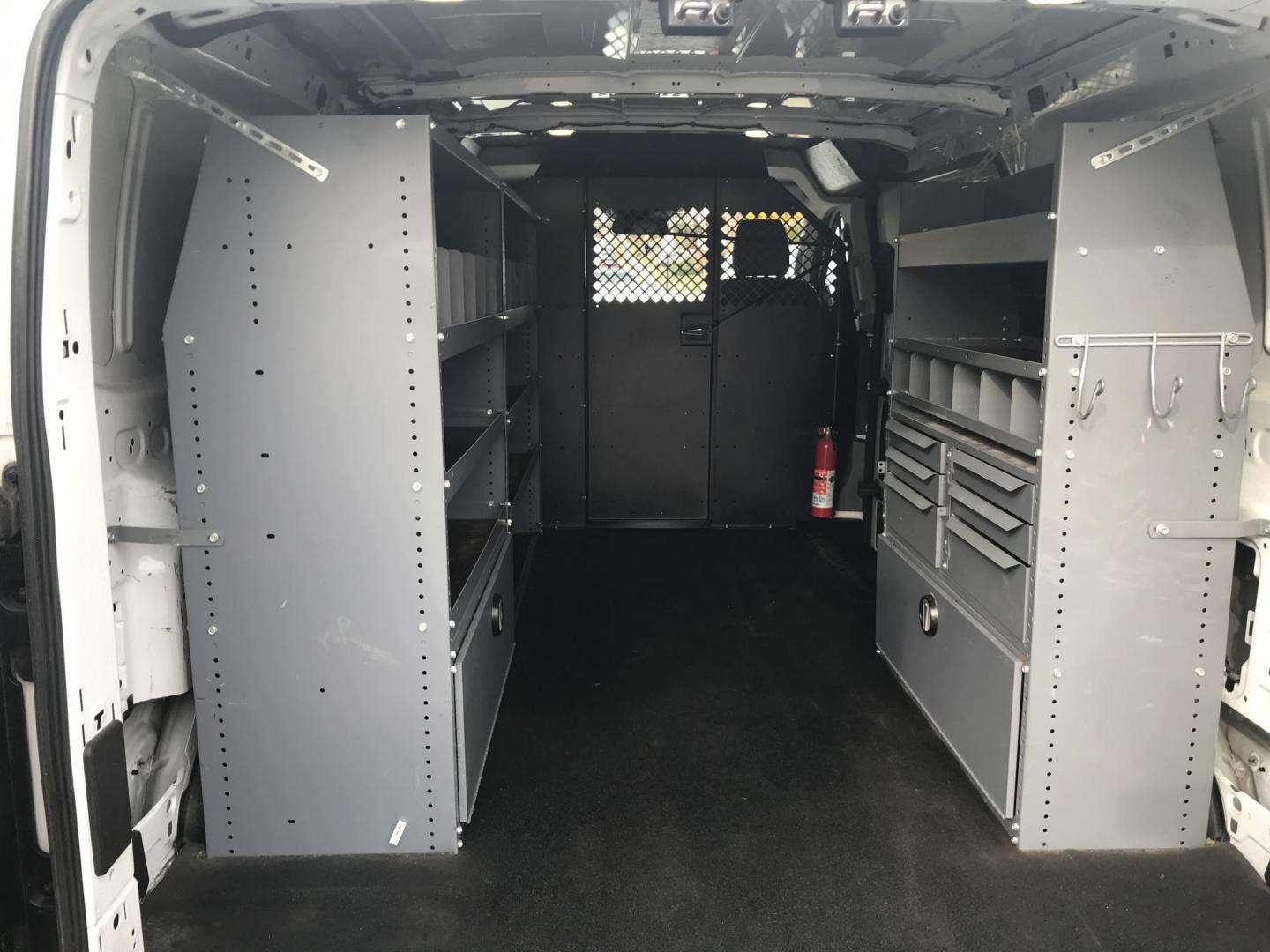 2017 White /Gray Ford Transit 150 Van Low Roof w/Sliding Pass. 130-in. WB (1FTYE1YM2HK) with an 3.7L V6 DOHC 24V engine, 6A transmission, located at 577 Chester Pike, Prospect Park, PA, 19076, (610) 237-1015, 39.886154, -75.302338 - 2017 Ford Transit 150: Double drop down ladder racks, shelving, backup camera, partition, new PA inspection, FLEET MAINTAINED, runs LIKE NEW! This vehicle comes inspected and has been given a bumper to bumper safety check. It is very clean, reliable, and well maintained. We offer a unique pay pla - Photo#15