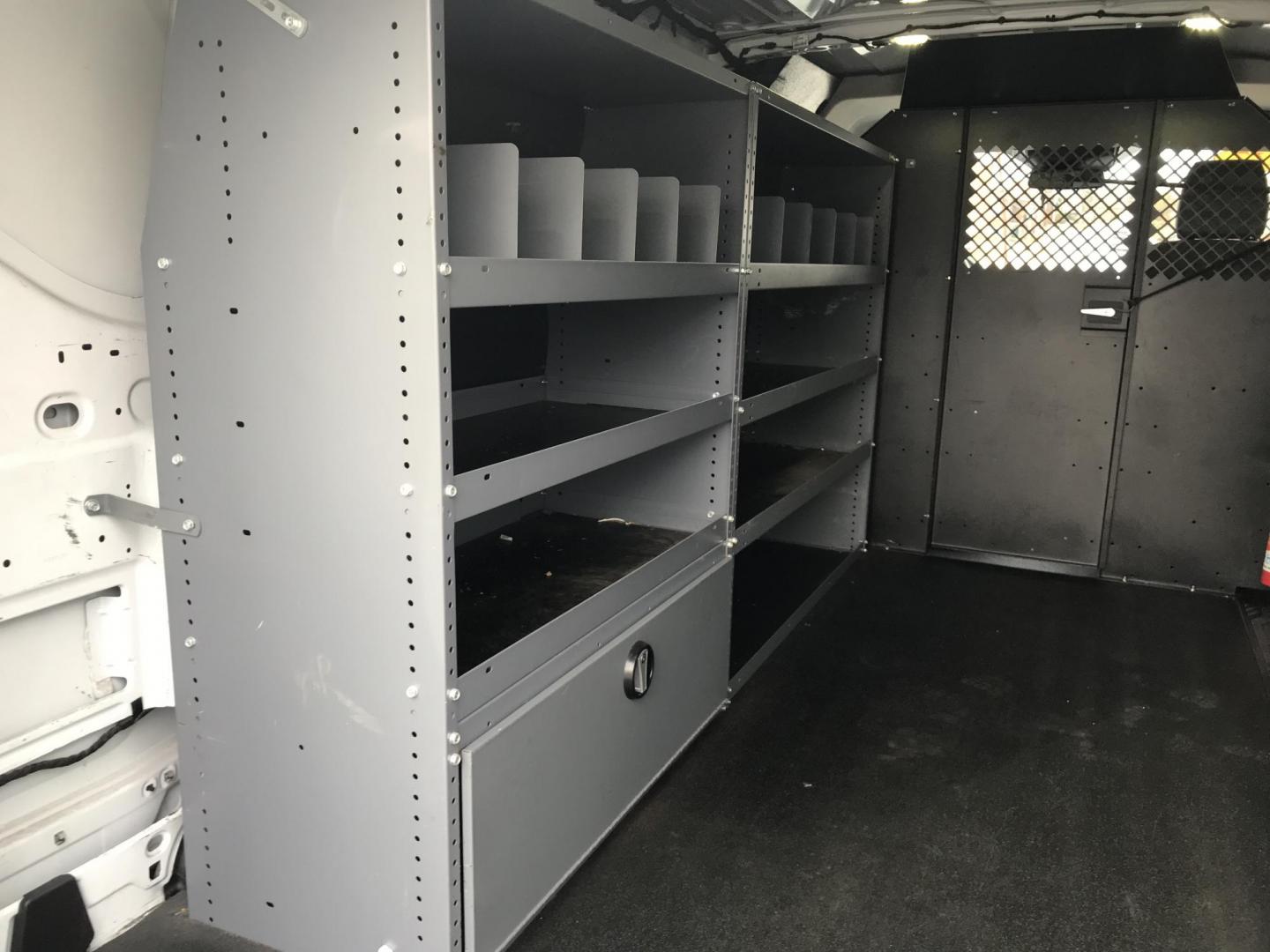 2017 White /Gray Ford Transit 150 Van Low Roof w/Sliding Pass. 130-in. WB (1FTYE1YM2HK) with an 3.7L V6 DOHC 24V engine, 6A transmission, located at 577 Chester Pike, Prospect Park, PA, 19076, (610) 237-1015, 39.886154, -75.302338 - 2017 Ford Transit 150: Double drop down ladder racks, shelving, backup camera, partition, new PA inspection, FLEET MAINTAINED, runs LIKE NEW! This vehicle comes inspected and has been given a bumper to bumper safety check. It is very clean, reliable, and well maintained. We offer a unique pay pla - Photo#16