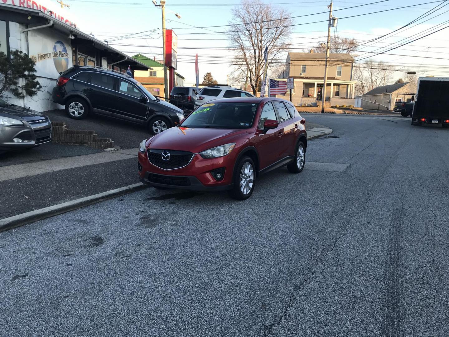 2015 Red /Black Mazda CX-5 Grand Touring AWD (JM3KE4DY2F0) with an 2.5L L4 DOHC 16V engine, 6-Speed Automatic transmission, located at 577 Chester Pike, Prospect Park, PA, 19076, (610) 237-1015, 39.886154, -75.302338 - 2015 Mazda CX-7 Grand Touring: AWD, backup camera, sunroof, new PA inspection, runs LIKE NEW! This vehicle comes inspected and has been given a bumper to bumper safety check. It is very clean, reliable, and well maintained. We offer a unique pay plan that is known for being the easiest and fastes - Photo#1