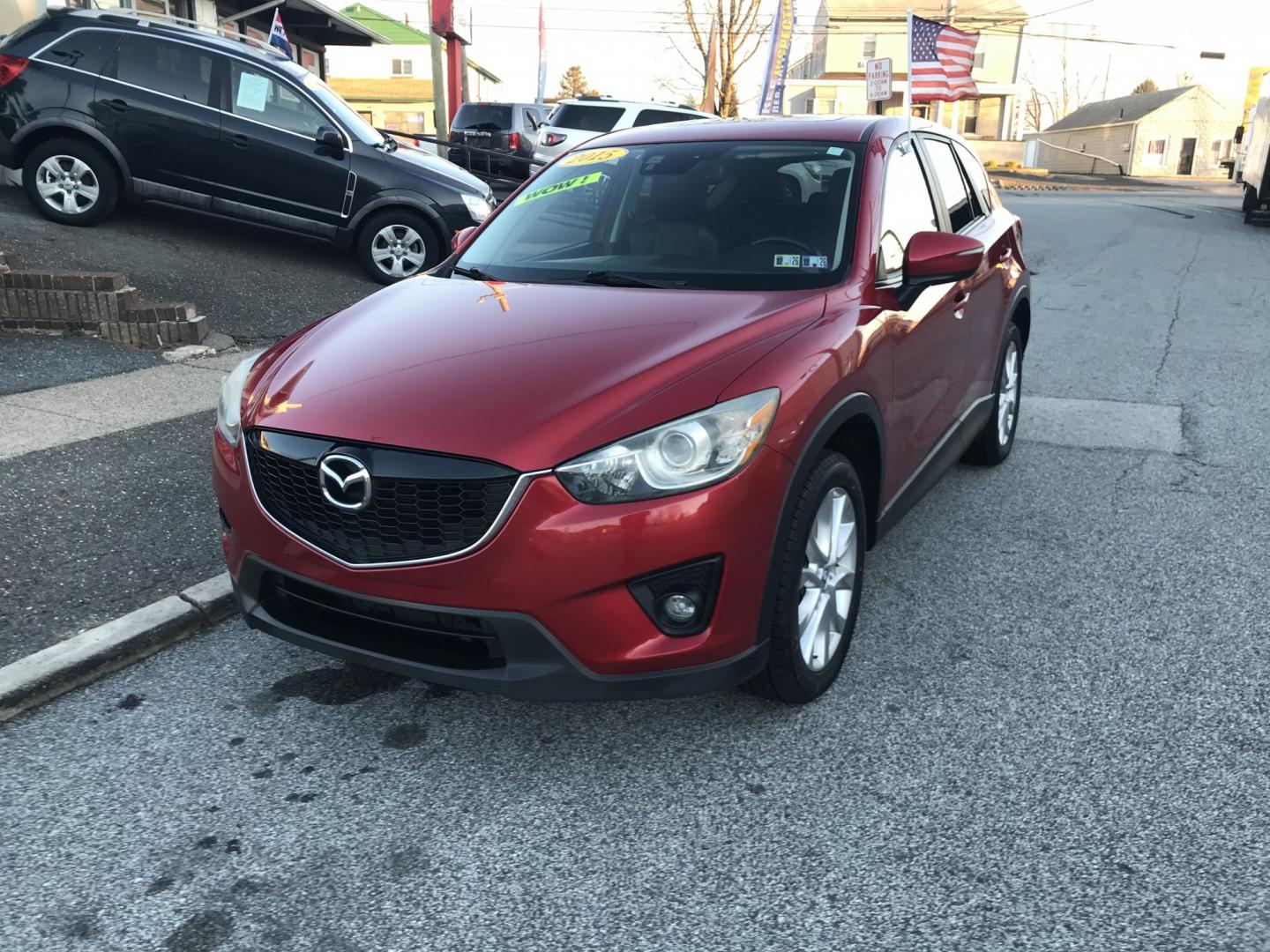 2015 Red /Black Mazda CX-5 Grand Touring AWD (JM3KE4DY2F0) with an 2.5L L4 DOHC 16V engine, 6-Speed Automatic transmission, located at 577 Chester Pike, Prospect Park, PA, 19076, (610) 237-1015, 39.886154, -75.302338 - 2015 Mazda CX-7 Grand Touring: AWD, backup camera, sunroof, new PA inspection, runs LIKE NEW! This vehicle comes inspected and has been given a bumper to bumper safety check. It is very clean, reliable, and well maintained. We offer a unique pay plan that is known for being the easiest and fastes - Photo#2