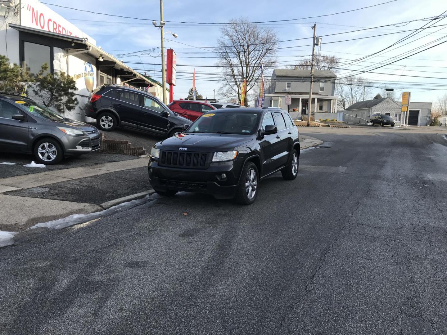 2013 Black /Black Jeep Grand Cherokee Laredo 4WD (1C4RJFAG4DC) with an 3.6L V6 DOHC 24V engine, 5-Speed Automatic transmission, located at 577 Chester Pike, Prospect Park, PA, 19076, (610) 237-1015, 39.886154, -75.302338 - 2013 Jeep Grand Cherokee Laredo: Backup camera, sunroof, new PA inspection, SUPER CLEAN, runs LIKE NEW! This vehicle comes inspected and has been given a bumper to bumper safety check. It is very clean, reliable, and well maintained. We offer a unique pay plan that is known for being the easiest - Photo#1