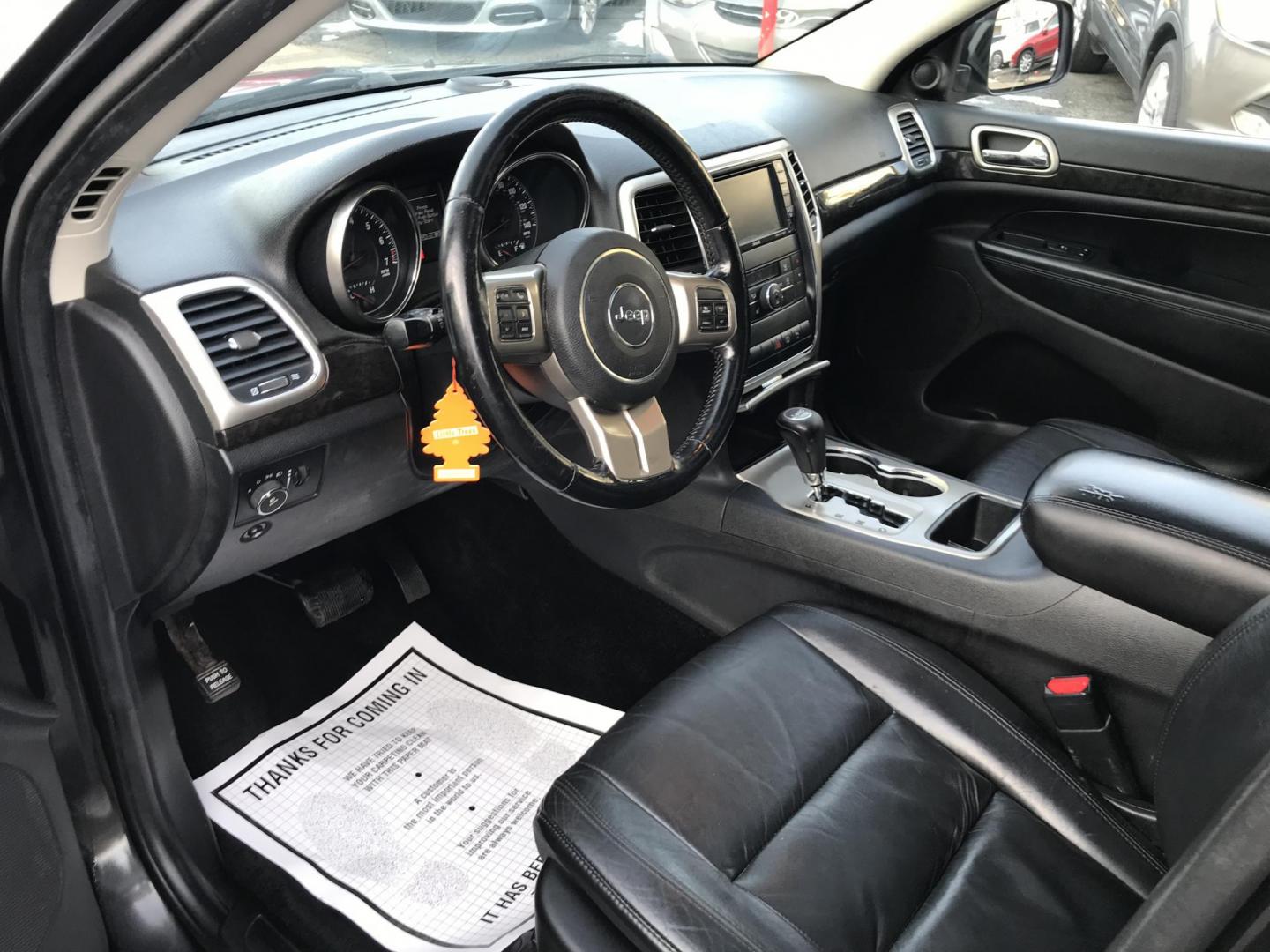 2013 Black /Black Jeep Grand Cherokee Laredo 4WD (1C4RJFAG4DC) with an 3.6L V6 DOHC 24V engine, 5-Speed Automatic transmission, located at 577 Chester Pike, Prospect Park, PA, 19076, (610) 237-1015, 39.886154, -75.302338 - 2013 Jeep Grand Cherokee Laredo: Backup camera, sunroof, new PA inspection, SUPER CLEAN, runs LIKE NEW! This vehicle comes inspected and has been given a bumper to bumper safety check. It is very clean, reliable, and well maintained. We offer a unique pay plan that is known for being the easiest - Photo#8
