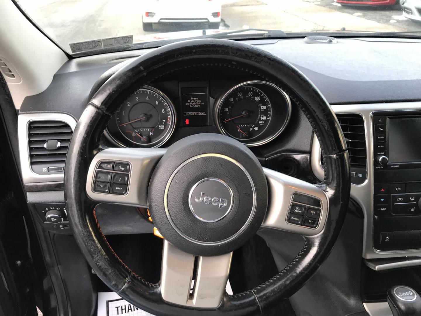 2013 Black /Black Jeep Grand Cherokee Laredo 4WD (1C4RJFAG4DC) with an 3.6L V6 DOHC 24V engine, 5-Speed Automatic transmission, located at 577 Chester Pike, Prospect Park, PA, 19076, (610) 237-1015, 39.886154, -75.302338 - 2013 Jeep Grand Cherokee Laredo: Backup camera, sunroof, new PA inspection, SUPER CLEAN, runs LIKE NEW! This vehicle comes inspected and has been given a bumper to bumper safety check. It is very clean, reliable, and well maintained. We offer a unique pay plan that is known for being the easiest - Photo#12